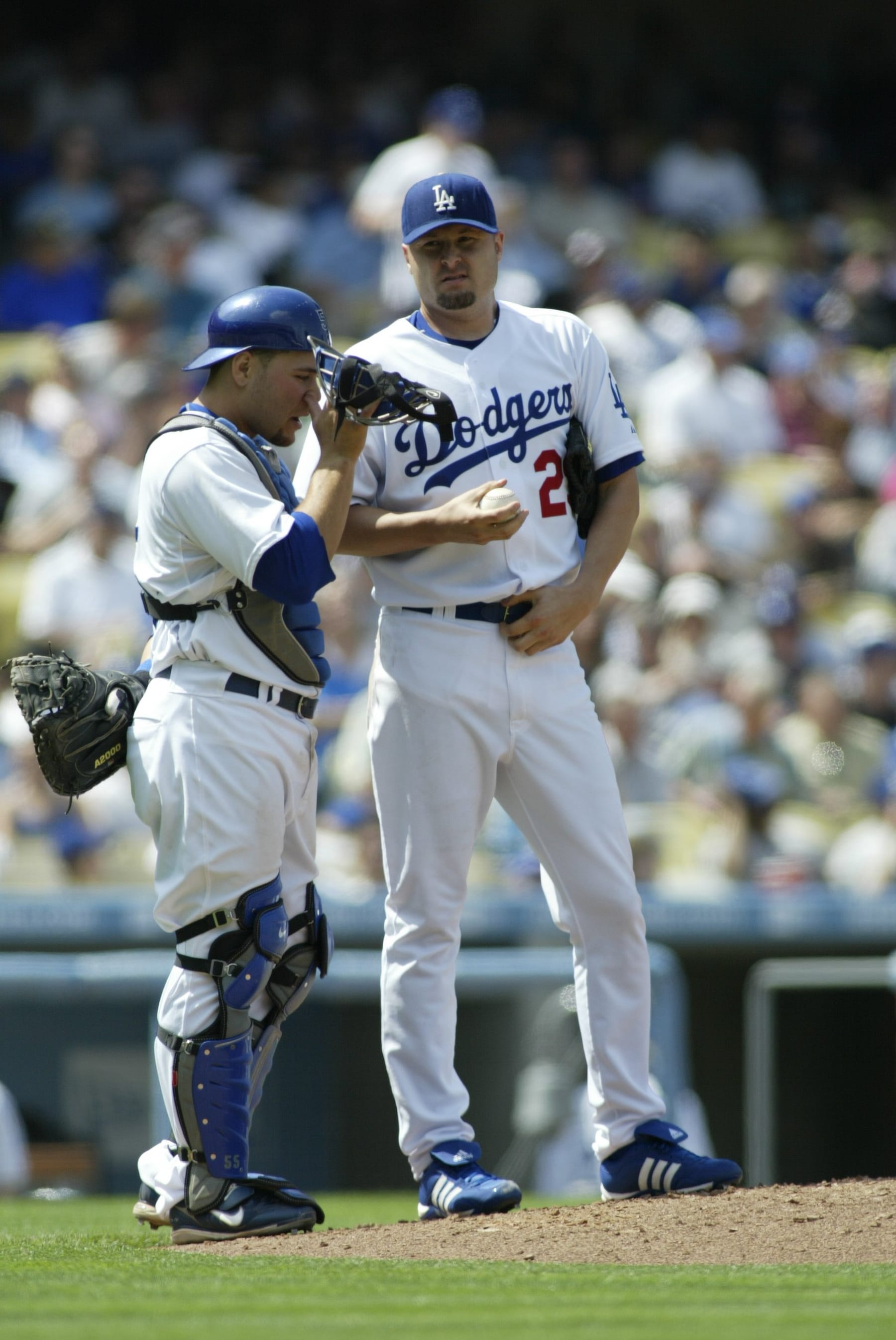 LOS ANGELES - APRIL 9:  Jason Schmidt and Russell Martin of the Los Angeles Dodgers talk on the mound during the game against the Colorado Rockies at Dodger Stadium in Los Angeles, California on April 9, 2007.  The Rockies defeated the Dodgers 6-3.  (Photo by Rob Leiter/MLB via Getty Images) 