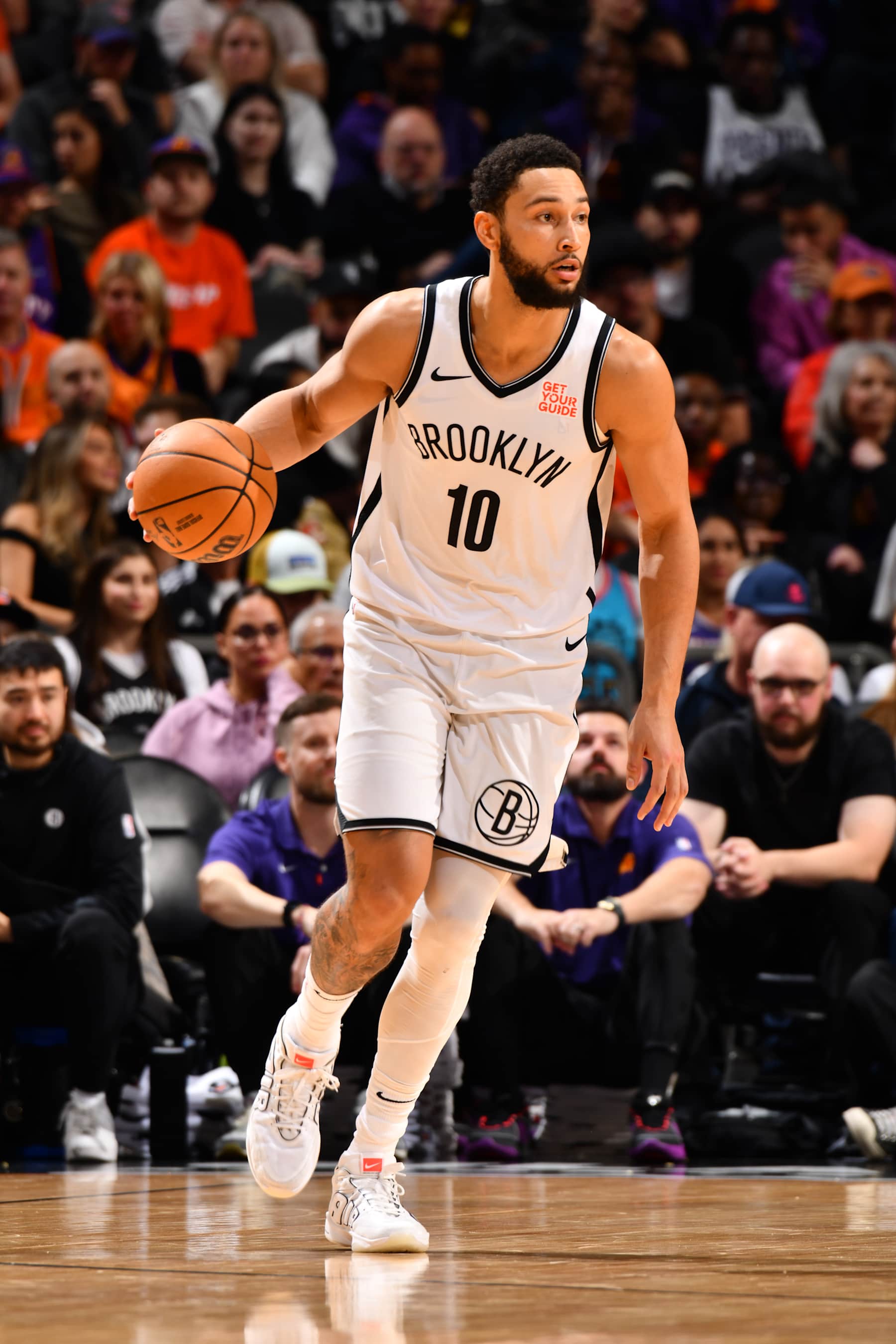 PHOENIX, AZ - NOVEMBER 27: Ben Simmons #10 of the Brooklyn Nets dribbles the ball during the game against the Phoenix Suns on November 27, 2024 at Footprint Center in Phoenix, Arizona. NOTE TO USER: User expressly acknowledges and agrees that, by downloading and or using this photograph, user is consenting to the terms and conditions of the Getty Images License Agreement. Mandatory Copyright Notice: Copyright 2024 NBAE (Photo by Barry Gossage/NBAE via Getty Images)