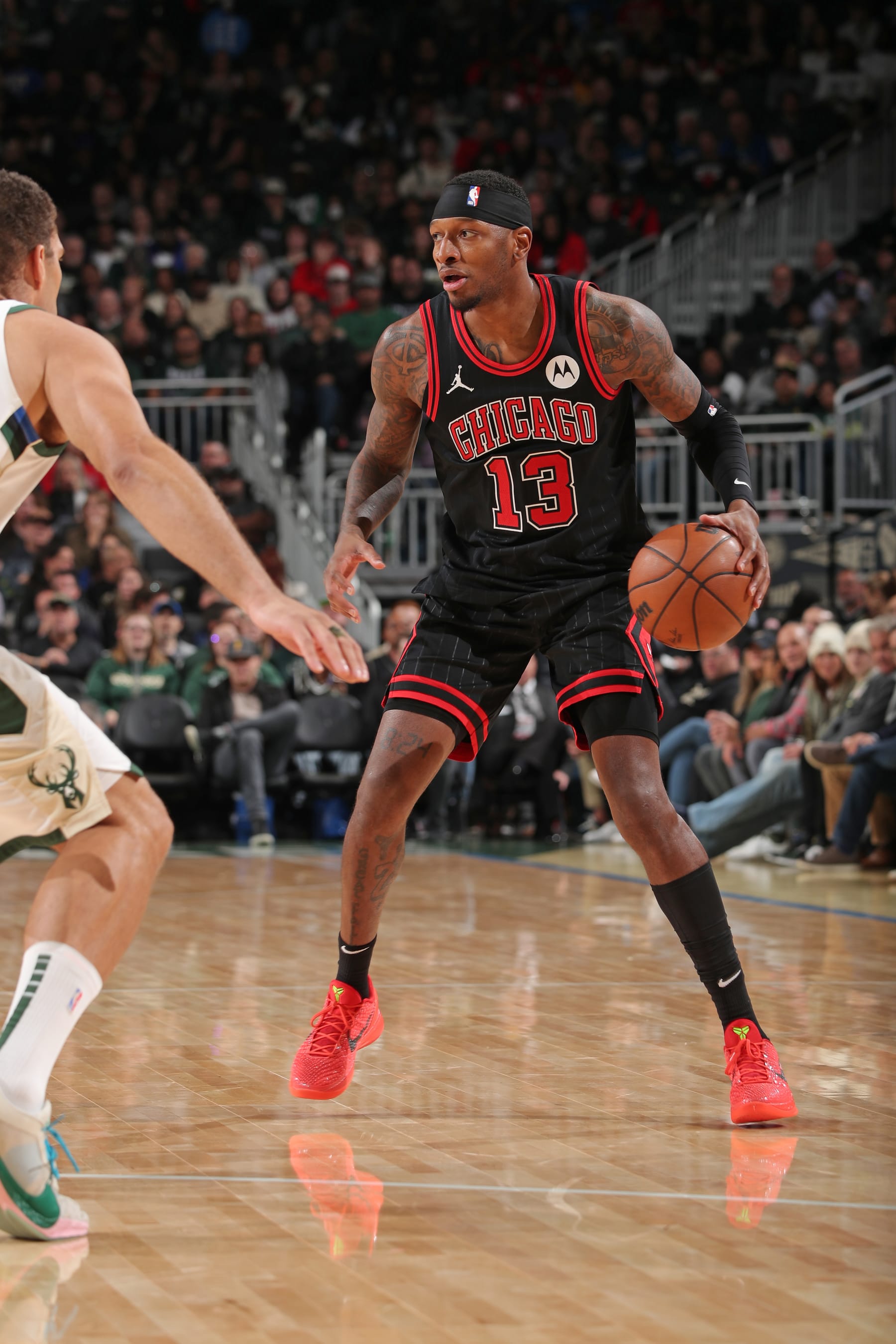 MILWAUKEE, WI - NOVEMBER 13: Torrey Craig #13 of Chicago Bulls dribbles the ball during the game against the Milwaukee Bucks on November 13, 2023 at the Fiserv Forum in Milwaukee, Wisconsin. NOTE TO USER: User expressly acknowledges and agrees that, by downloading and or using this Photograph, user is consenting to the terms and conditions of the Getty Images License Agreement. Mandatory Copyright Notice: Copyright 2023 NBAE (Photo by Gary Dineen/NBAE via Getty Images).