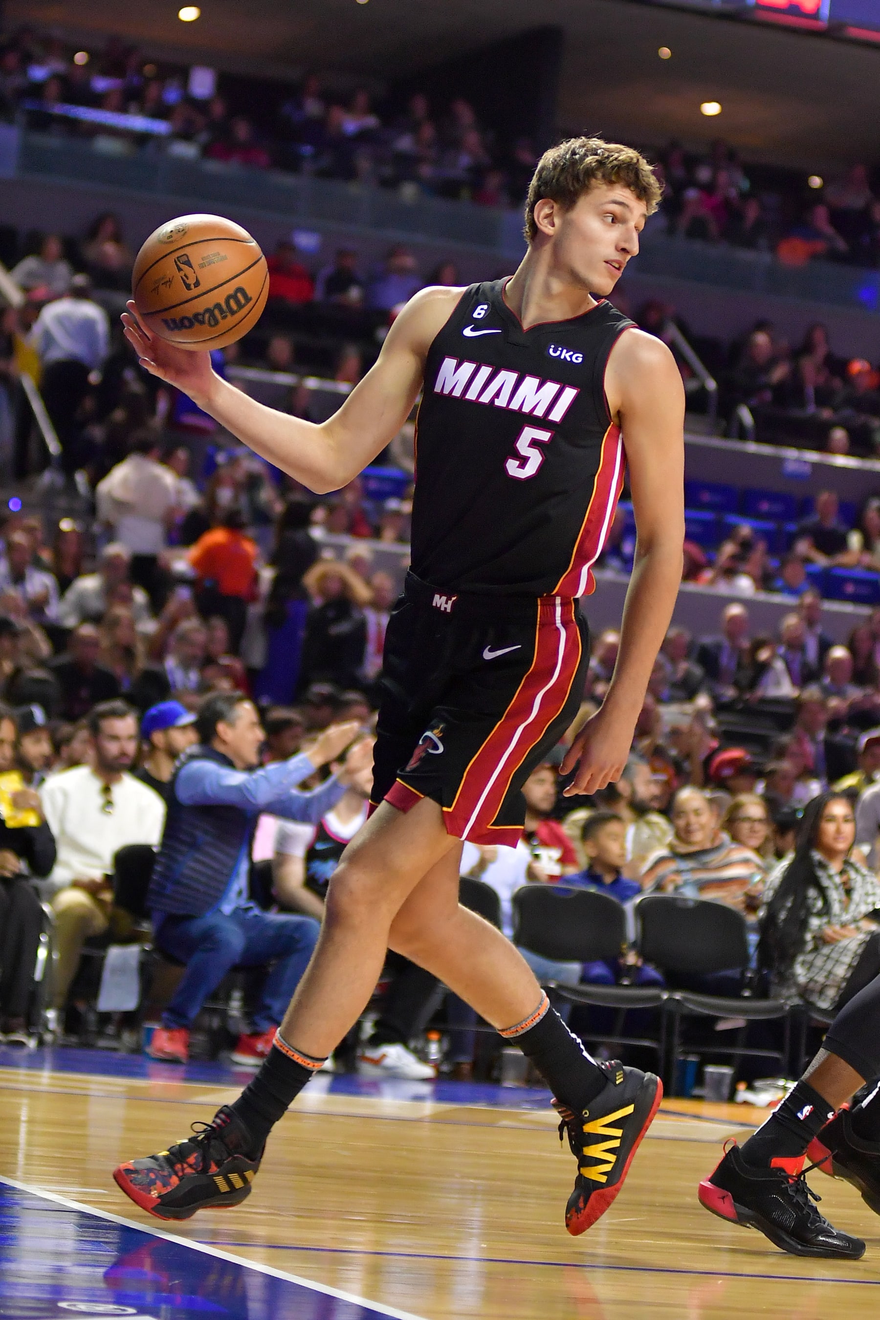 MEXICO CITY, MX - DECEMBER 17: Nikola Jovic #5 of the Miami Heat dribbles the ball during the game against the San Antonio Spurs on December 17, 2022 at Arena Ciudad de Mexico in Mexico City, Mexico. NOTE TO USER: User expressly acknowledges and agrees that, by downloading and or using this photograph, User is consenting to the terms and conditions of the Getty Images License Agreement. Mandatory Copyright Notice: Copyright 2022 NBAE (Photo by Michael Gonzales/NBAE via Getty Images)