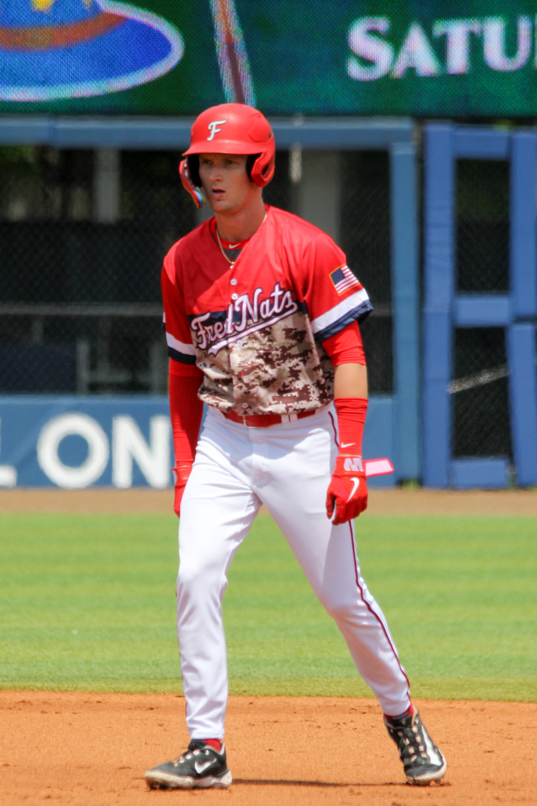 FREDERICKSBURG, VIRGINIA - APRIL 23, 2023: Robert Hassell #34 of the Fredericksburg Nationals takes a lead at second base during a game against the Delmarva Shorebirds at Virginia Credit Union Stadium on April 23, 2023 in Fredericksburg, Virginia. (Photo by Rodger Wood/Diamond Images via Getty Images)