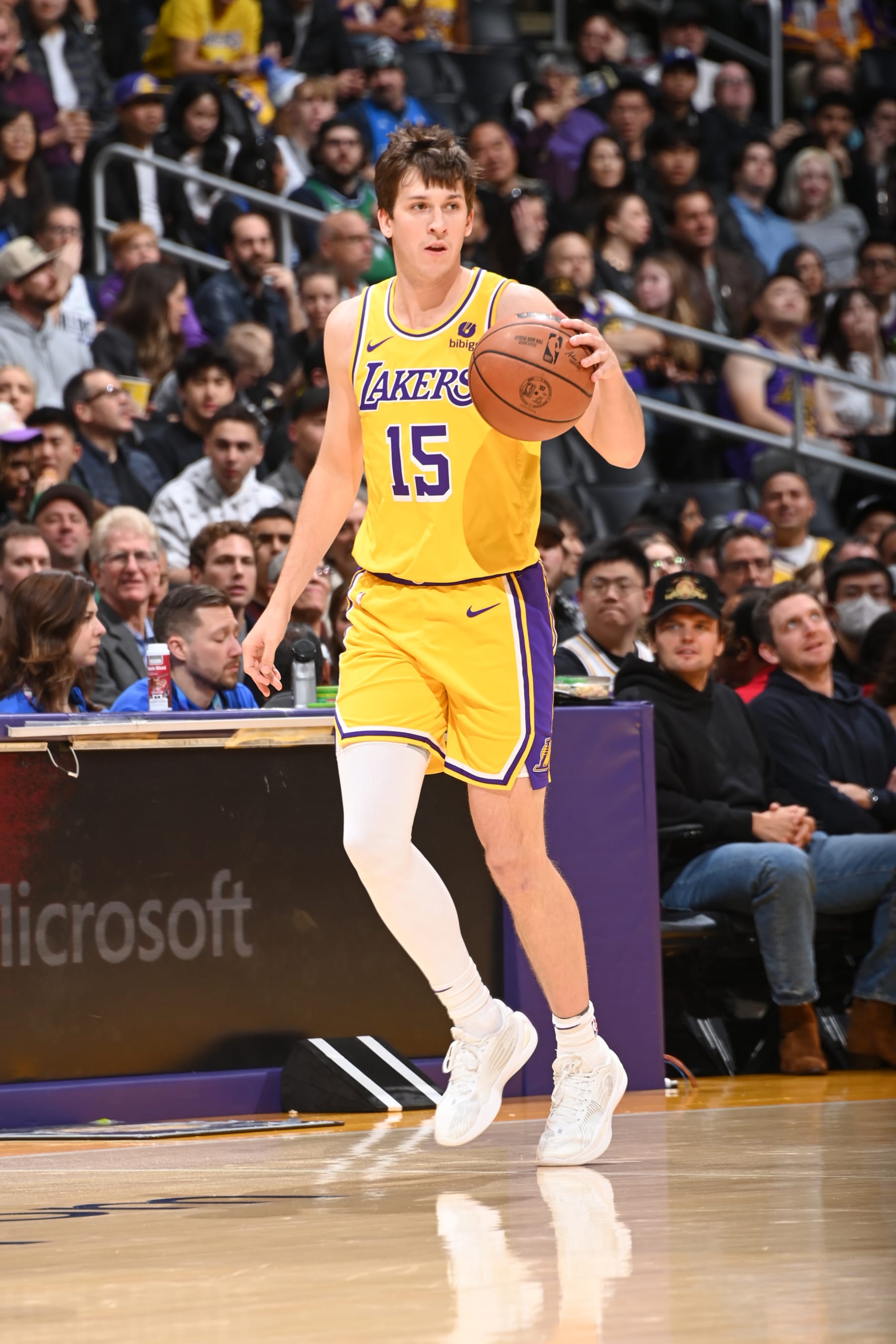 LOS ANGELES, CA - JANUARY 17:  Austin Reaves #15 of the Los Angeles Lakers handles the ball during the game  on January 17, 2024 at Crypto.Com Arena in Los Angeles, California. NOTE TO USER: User expressly acknowledges and agrees that, by downloading and/or using this Photograph, user is consenting to the terms and conditions of the Getty Images License Agreement. Mandatory Copyright Notice: Copyright 2024 NBAE (Photo by Andrew D. Bernstein/NBAE via Getty Images)
