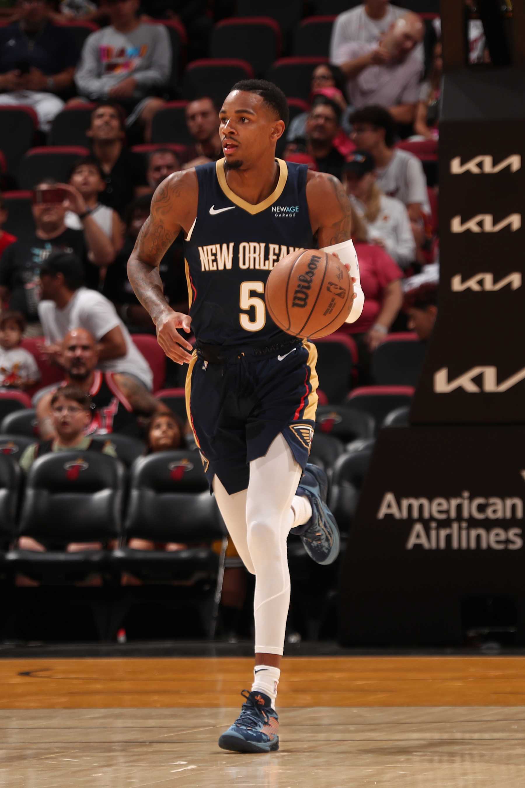 MIAMI, FL - OCTOBER 13: Dejounte Murray #5 of the New Orleans Pelicans dribbles the ball during the game against the Miami Heat during a NBA pre season game on October 13, 2024 at Kaseya Center in Miami, Florida. NOTE TO USER: User expressly acknowledges and agrees that, by downloading and or using this Photograph, user is consenting to the terms and conditions of the Getty Images License Agreement. Mandatory Copyright Notice: Copyright 2024 NBAE (Photo by Issac Baldizon/NBAE via Getty Images)
