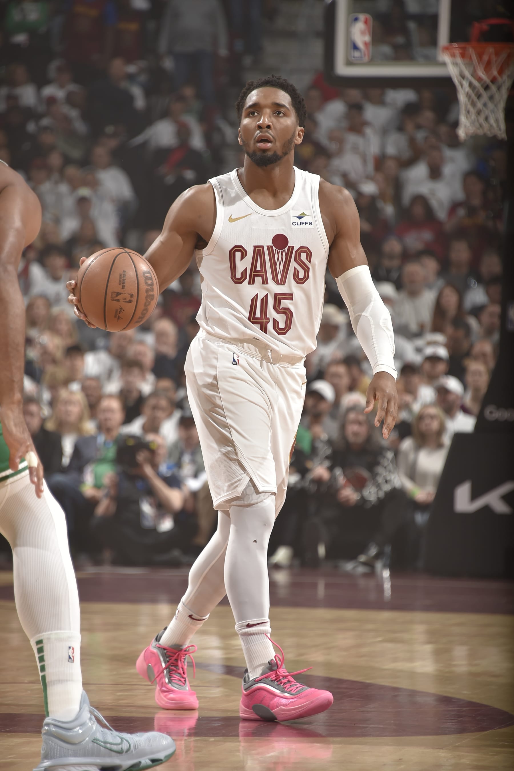 CLEVELAND, OH - MAY 11: Donovan Mitchell #45 of the Cleveland Cavaliers dribbles the ball during the game against the Boston Celtics during Round 2 Game 3 of the 2024 NBA Playoffs on May 11, 2024 at Rocket Mortgage FieldHouse in Cleveland, Ohio. NOTE TO USER: User expressly acknowledges and agrees that, by downloading and/or using this Photograph, user is consenting to the terms and conditions of the Getty Images License Agreement. Mandatory Copyright Notice: Copyright 2024 NBAE (Photo by David Liam Kyle/NBAE via Getty Images)