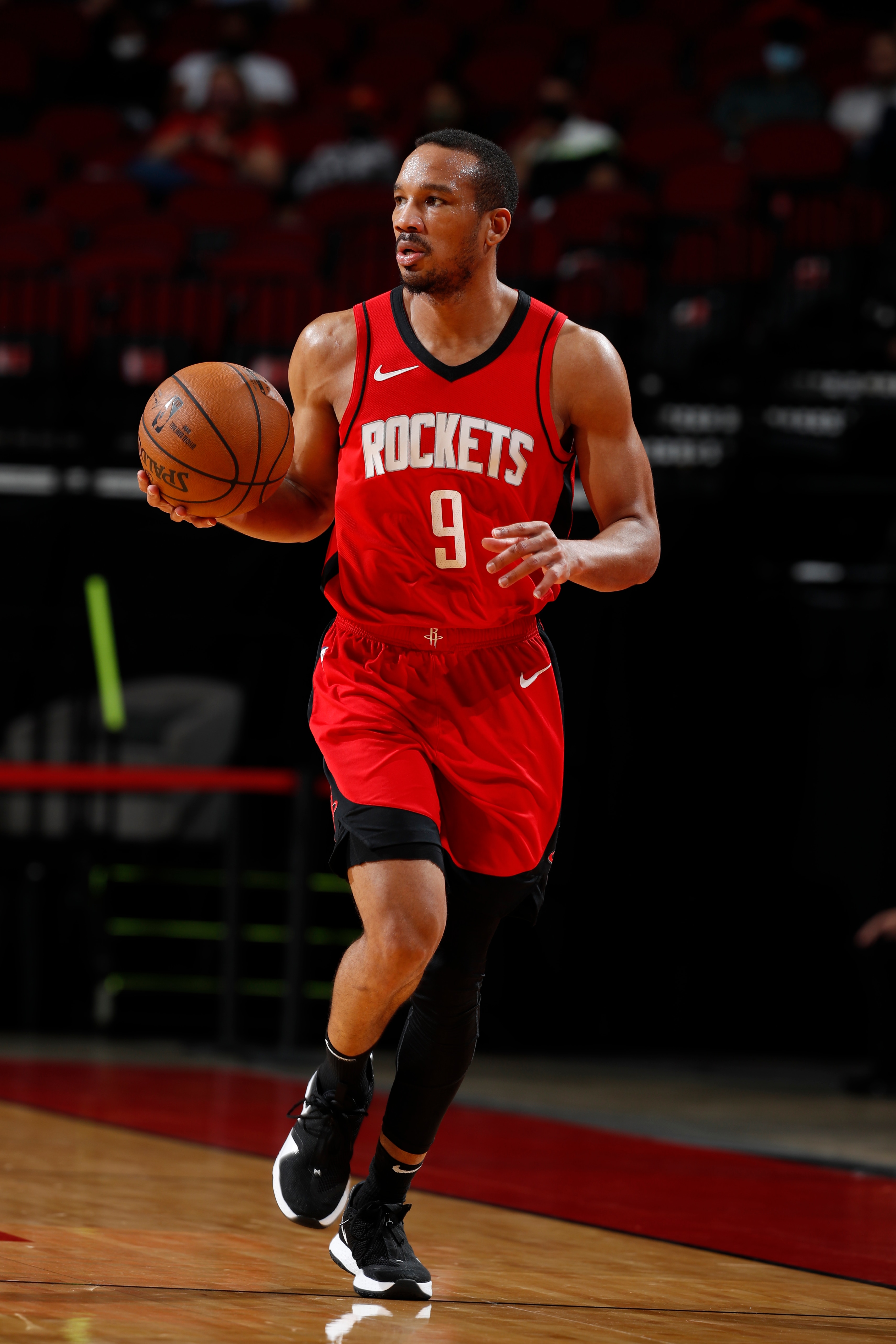 HOUSTON, TX - APRIL 27: Avery Bradley #9 of the Houston Rockets handles the ball against the Minnesota Timberwolves on April 27 at the Toyota Center in Houston, Texas. NOTE TO USER: User expressly acknowledges and agrees that, by downloading and or using this photograph, User is consenting to the terms and conditions of the Getty Images License Agreement. Mandatory Copyright Notice: Copyright 2021 NBAE (Photo by Robert Seale/NBAE via Getty Images)