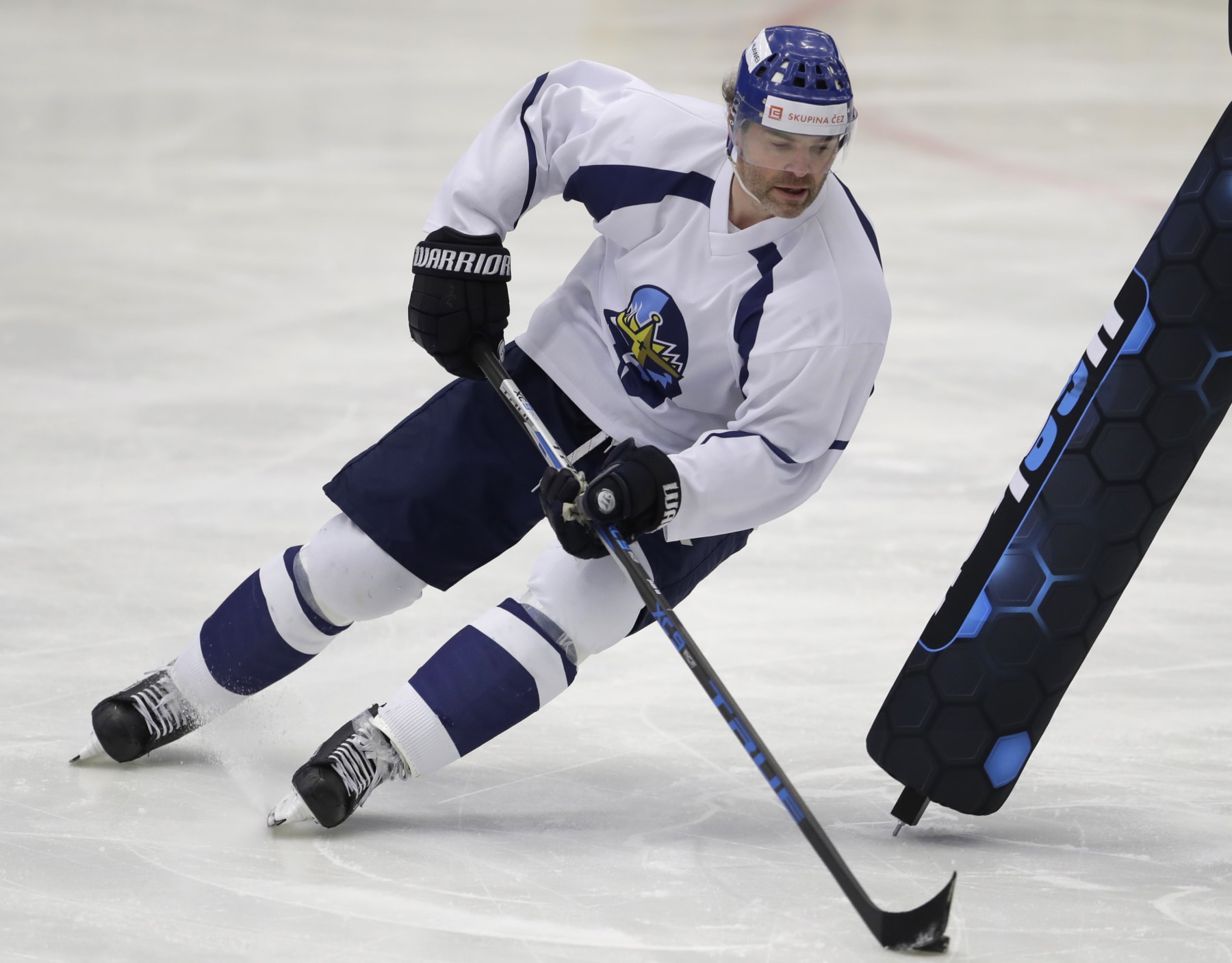 FILE-In this Thursday, Feb. 1, 2018, file photo, Jaromir Jagr during a practice session at the Kladno Knights hockey club in Kladno, Czech Republic. Jaromir Jagr is ageless. On Thursday April 29, 2021, the 49-year-old had an assist on the way to his Kladno Knights's 5-2 victory over Jihlava to clinch their playoff series 4-3 and qualify for the top Czech league in next season. (AP Photo/Petr David Josek/ File)
