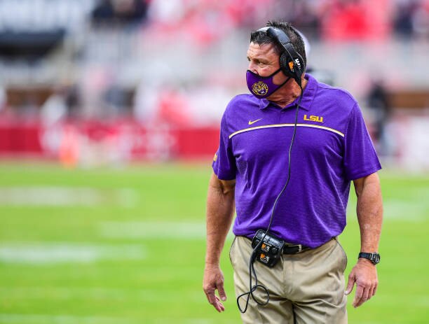 FAYETTEVILLE, AR - NOVEMBER 21: Head Coach Ed Orgeron of the LSU Tigers looks on from the sideline during the game against the Arkansas Razorbacks at Razorback Stadium on November 21, 2020 in Fayetteville, Arkansas. (Photo by Chris Parent/Collegiate Images/Getty Images)