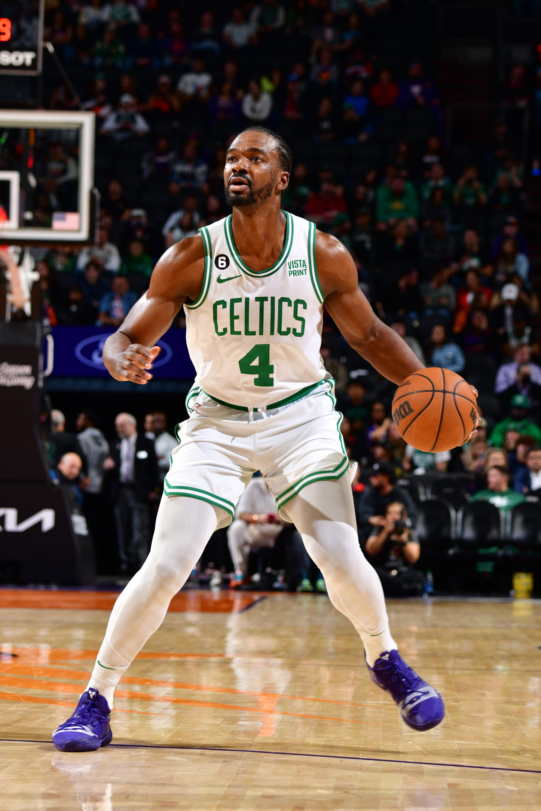 PHOENIX, AZ - DECEMBER 7: Noah Vonleh #4 of the Boston Celtics dribbles the ball during the game against the Phoenix Suns on December 7, 2022 at Footprint Center in Phoenix, Arizona. NOTE TO USER: User expressly acknowledges and agrees that, by downloading and or using this photograph, user is consenting to the terms and conditions of the Getty Images License Agreement. Mandatory Copyright Notice: Copyright 2022 NBAE (Photo by Barry Gossage/NBAE via Getty Images)