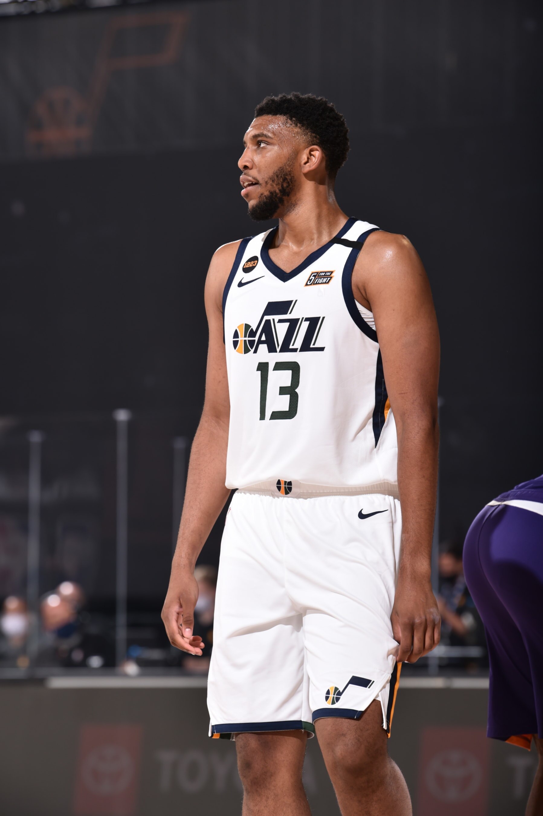 Orlando, FL - JULY 23: Tony Bradley #13 of the Utah Jazz looks on during a scrimmage on July 23, 2020 at The Arena at ESPN Wide World of Sports in Orlando, Florida. NOTE TO USER: User expressly acknowledges and agrees that, by downloading and/or using this Photograph, user is consenting to the terms and conditions of the Getty Images License Agreement. Mandatory Copyright Notice: Copyright 2020 NBAE (Photo by David Dow/NBAE via Getty Images)