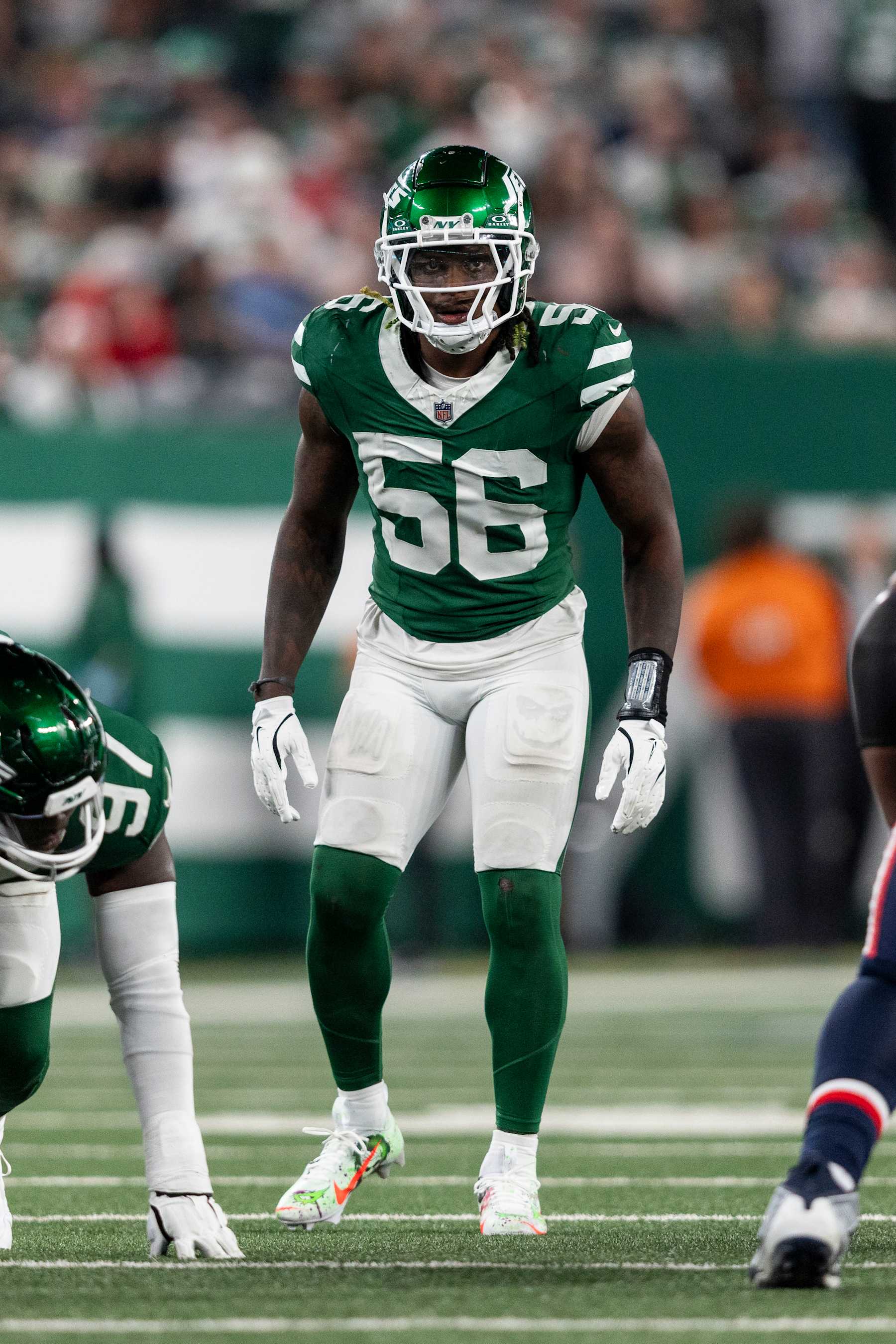 EAST RUTHERFORD, NEW JERSEY - SEPTEMBER 19: Quincy Williams #56 of the New York Jets looks on during an NFL football game between the New York Jets and the New England Patriots at MetLife Stadium on September 19, 2024 in East Rutherford, New Jersey. (Photo by Michael Owens/Getty Images)