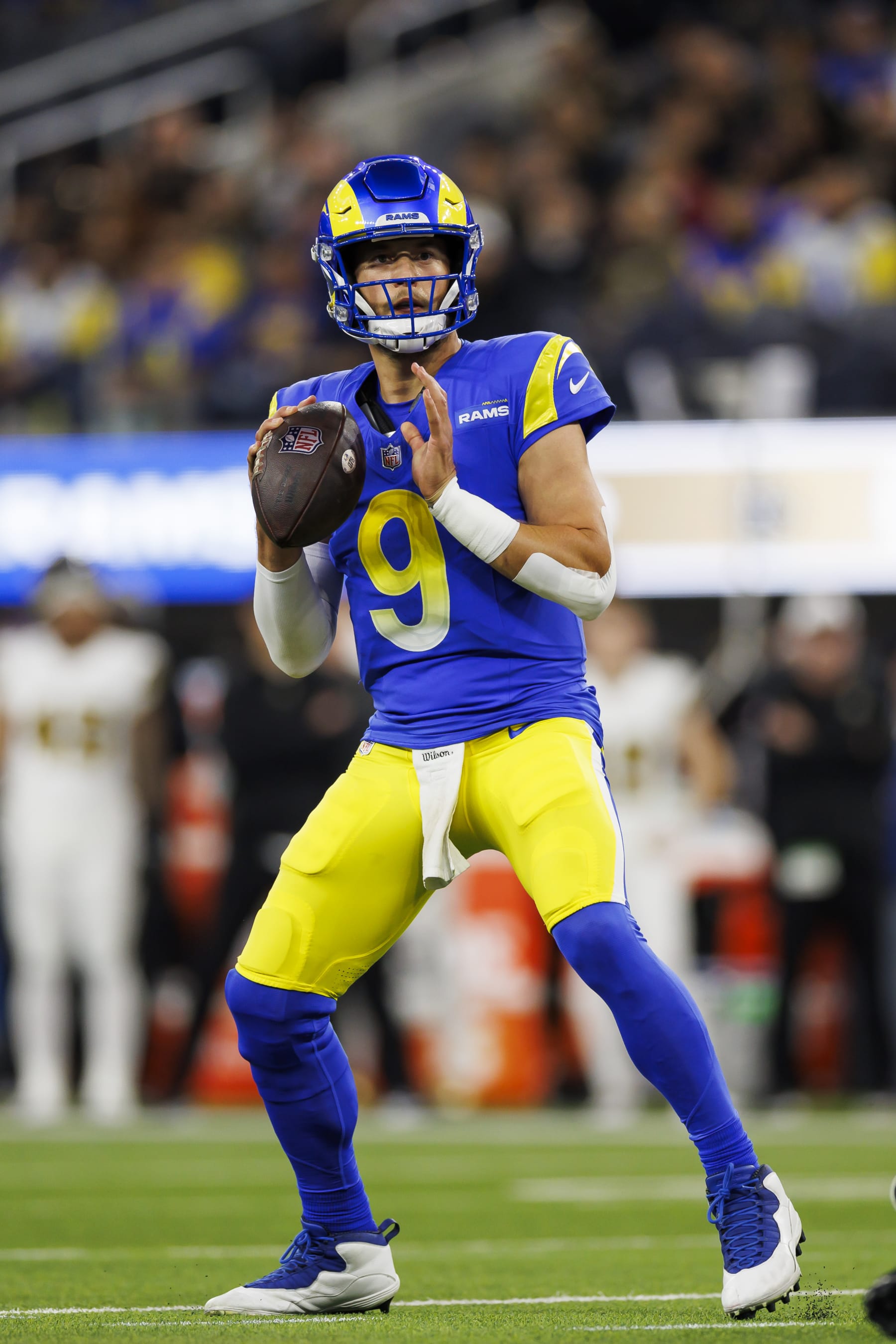 INGLEWOOD, CA - DECEMBER 21: Matthew Stafford #9 of the Los Angeles Rams looks for a pass during an NFL game against the New Orleans Saints at SoFi Stadium on December 21, 2023 in Inglewood, California. (Photo by Ryan Kang/Getty Images)