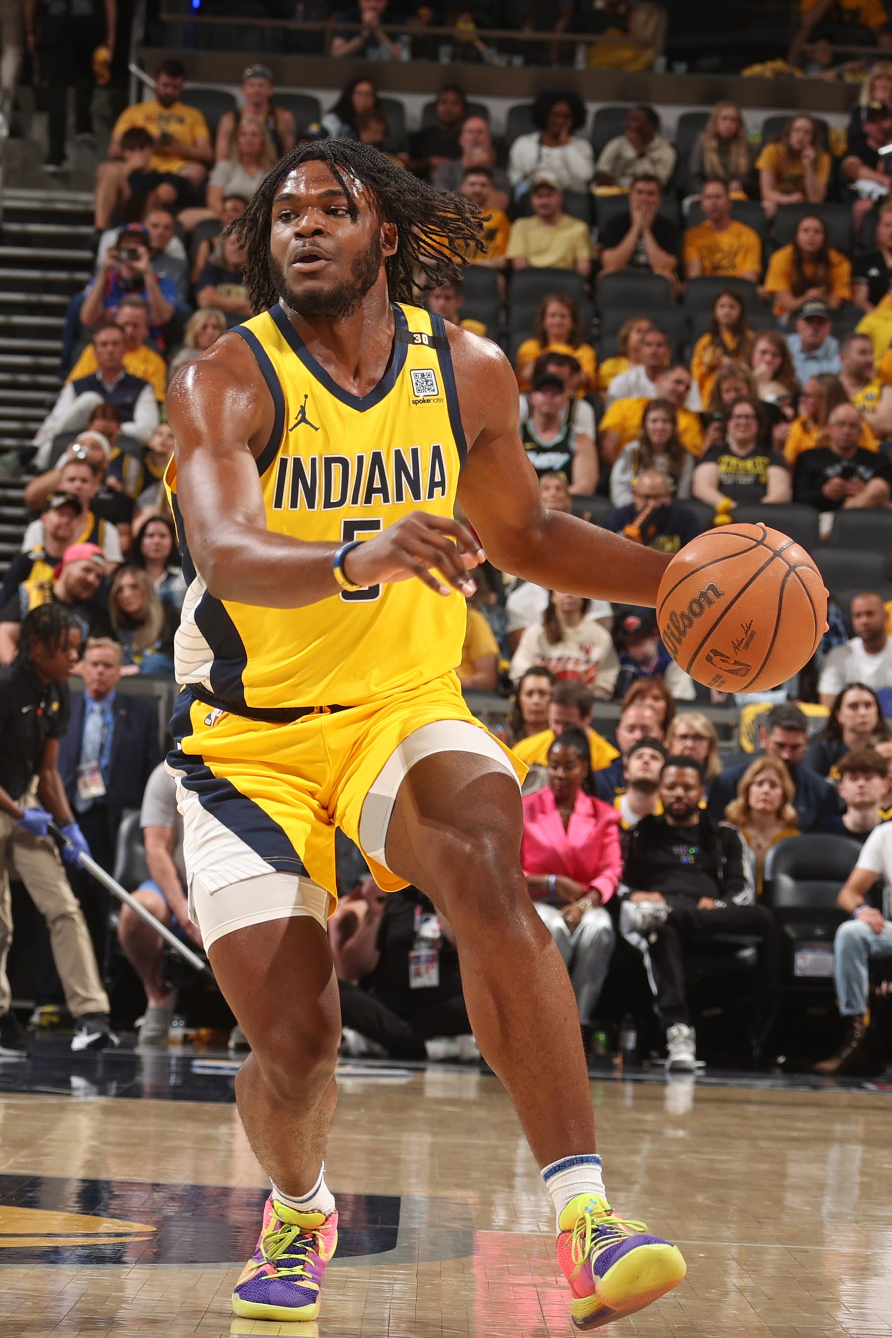 INDIANAPOLIS, IN - MAY 12: Jarace Walker #5 of the Indiana Pacers handles the ball during the game against the New York Knicks during Round 2 Game 4  of the 2024 NBA Playoffs on May 12, 2024 at Gainbridge Fieldhouse in Indianapolis, Indiana. NOTE TO USER: User expressly acknowledges and agrees that, by downloading and or using this Photograph, user is consenting to the terms and conditions of the Getty Images License Agreement. Mandatory Copyright Notice: Copyright 2024 NBAE (Photo by Nathaniel S. Butler/NBAE via Getty Images)