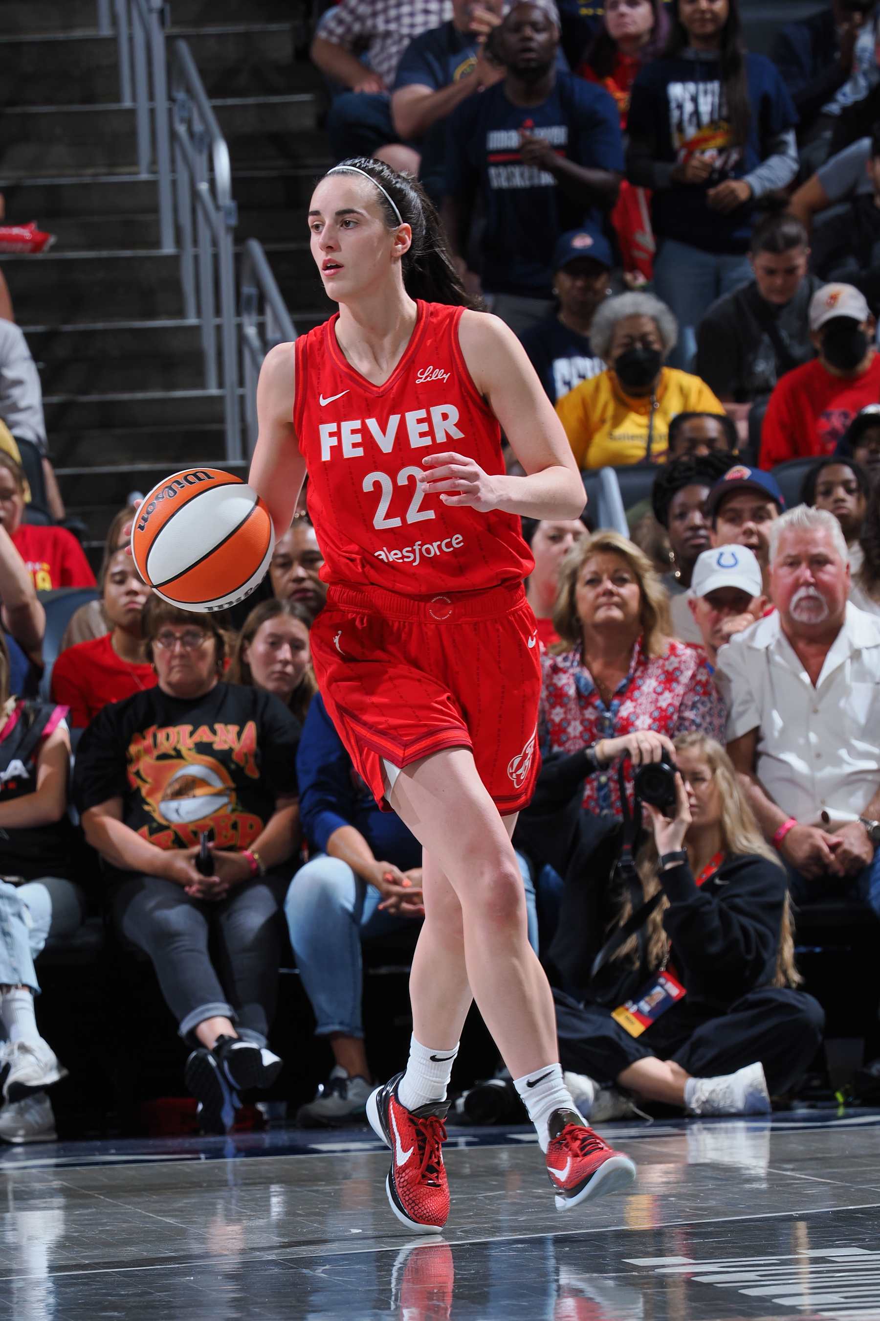 INDIANAPOLIS, IN - SEPTEMBER 8: Caitlin Clark #22 of the Indiana Fever handles the ball during the game against the Atlanta Dream  on September 8, 2024 at Gainbridge Fieldhouse in Indianapolis, Indiana. NOTE TO USER: User expressly acknowledges and agrees that, by downloading and or using this Photograph, user is consenting to the terms and conditions of the Getty Images License Agreement. Mandatory Copyright Notice: Copyright 2024 NBAE (Photo by Ron Hoskins/NBAE via Getty Images)