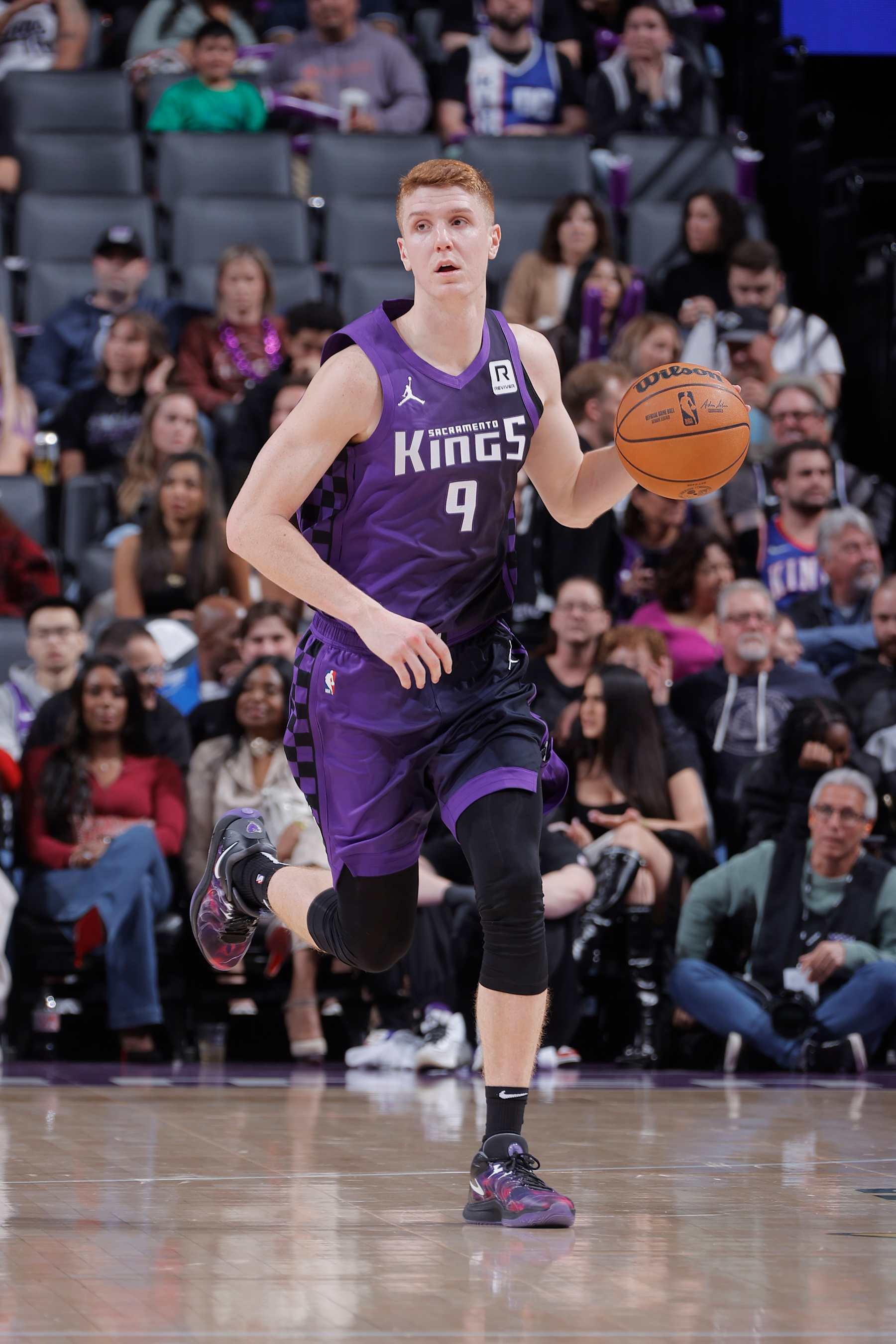 SACRAMENTO, CA - DECEMBER 8: Kevin Huerter #9 of the Sacramento Kings dribbles the ball during the game against the Utah Jazz on December 8, 2024 at Golden 1 Center in Sacramento, California. NOTE TO USER: User expressly acknowledges and agrees that, by downloading and or using this Photograph, user is consenting to the terms and conditions of the Getty Images License Agreement. Mandatory Copyright Notice: Copyright 2024 NBAE (Photo by Rocky Widner/NBAE via Getty Images)