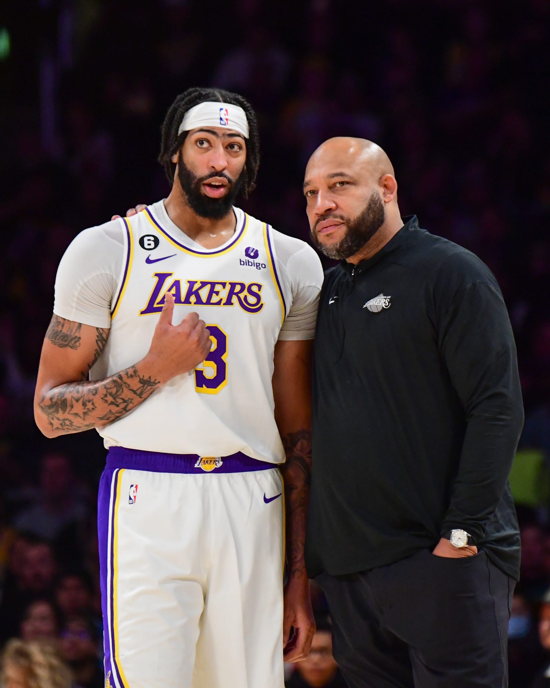LOS ANGELES, CA - MARCH 5:  Head Coach Darvin Ham of the Los Angeles Lakers and Anthony Davis #3 of the Los Angeles Lakers looks on during the game on March 5, 2023 at Crypto.Com Arena in Los Angeles, California. NOTE TO USER: User expressly acknowledges and agrees that, by downloading and/or using this Photograph, user is consenting to the terms and conditions of the Getty Images License Agreement. Mandatory Copyright Notice: Copyright 2023 NBAE (Photo by Adam Pantozzi/NBAE via Getty Images)