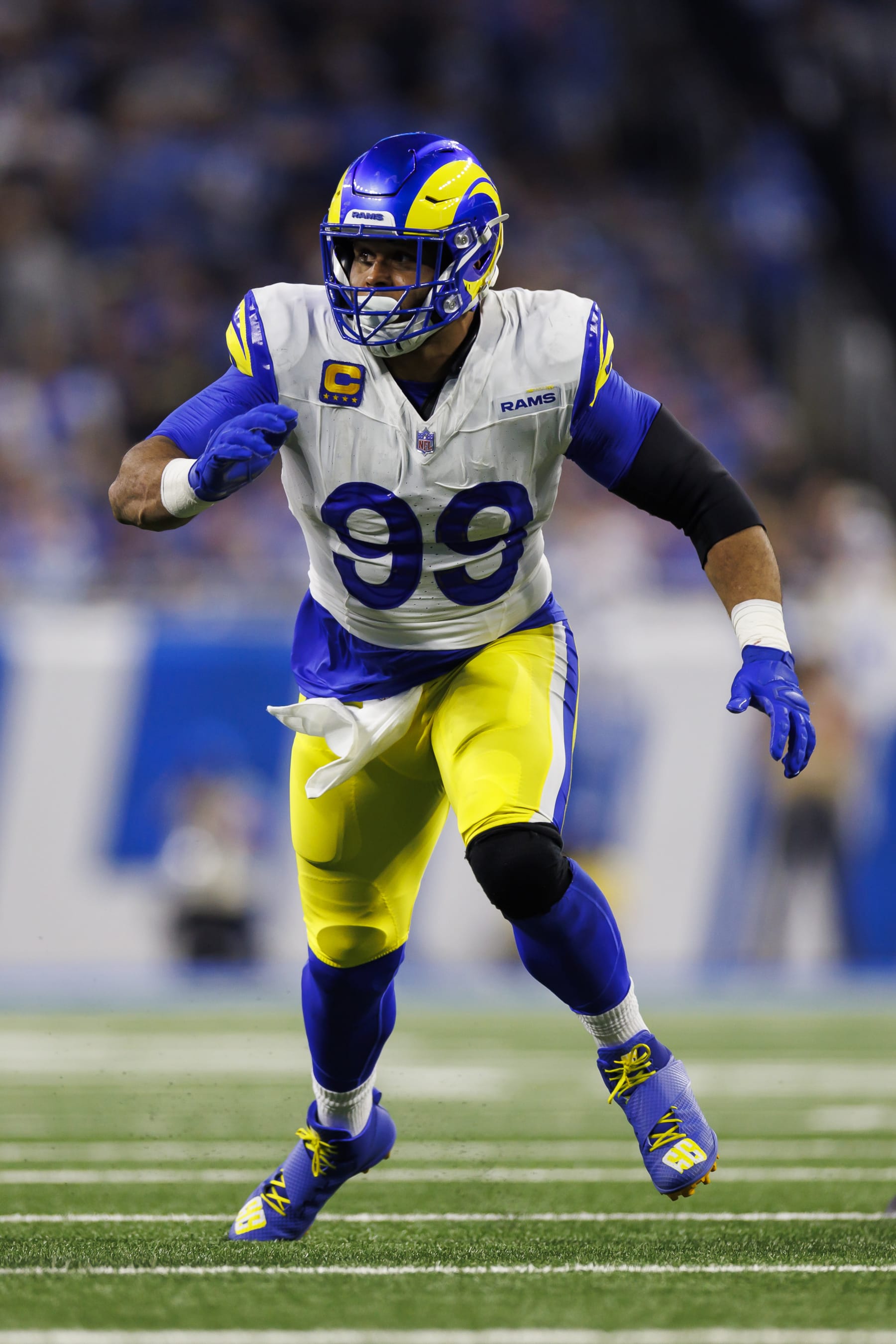 DETROIT, MICHIGAN - JANUARY 14: Aaron Donald #99 of the Los Angeles Rams runs around the edge during an NFC Wild Card Playoff football game against the Detroit Lions at Ford Field on January 14, 2024 in Detroit, Michigan. (Photo by Ryan Kang/Getty Images)
