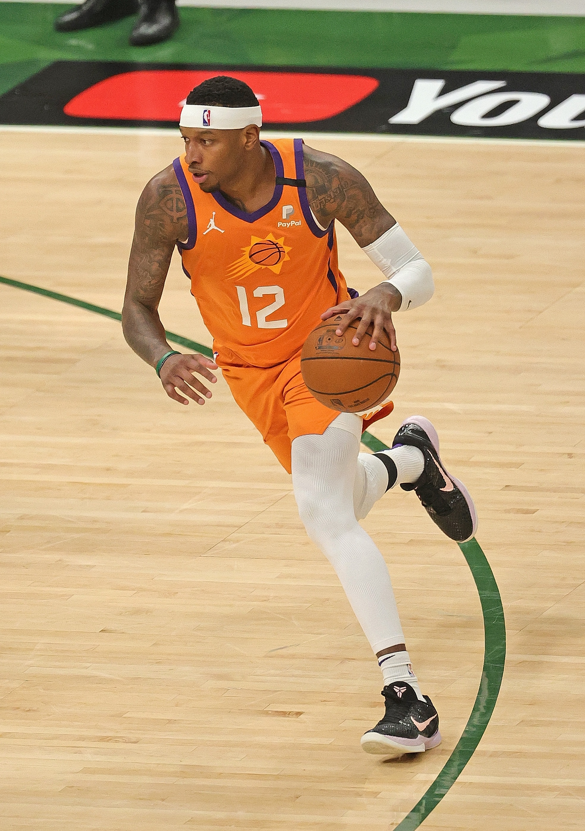 MILWAUKEE, WISCONSIN - JULY 14: Torrey Craig #12 of the Phoenix Suns moves against the Milwaukee Bucks at Fiserv Forum on July 14, 2021 in Milwaukee, Wisconsin. The Bucks defeated the Suns 109-103. (Photo by Jonathan Daniel/Getty Images)