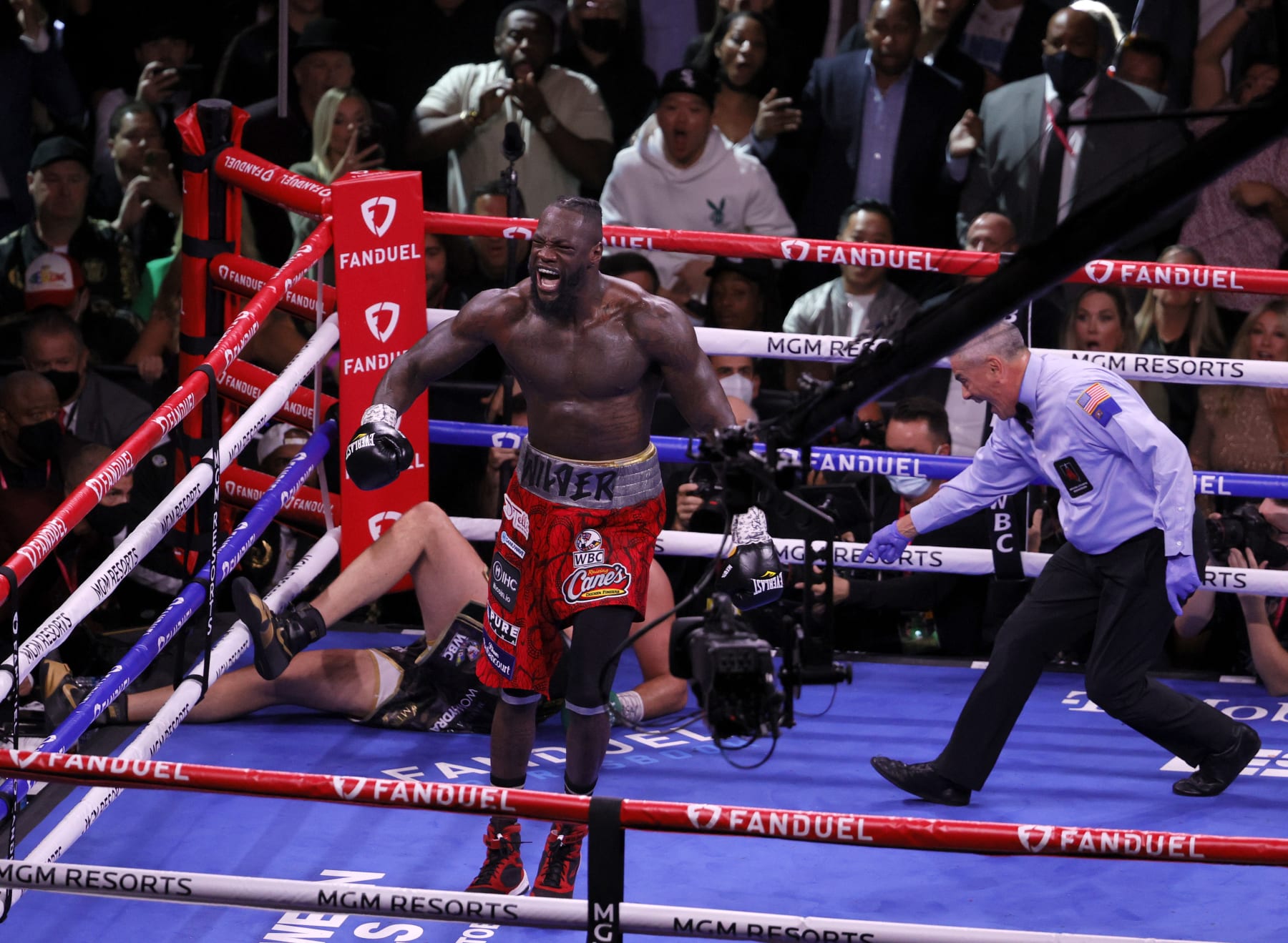 LAS VEGAS, NEVADA - OCTOBER 09:  Deontay Wilder reacts after knocking Tyson Fury down as referee Russell Mora moves in during the fourth round of their WBC heavyweight title fight at T-Mobile Arena on October 9, 2021 in Las Vegas, Nevada. Fury retained his title with an 11th-round knockout.  (Photo by Ethan Miller/Getty Images)