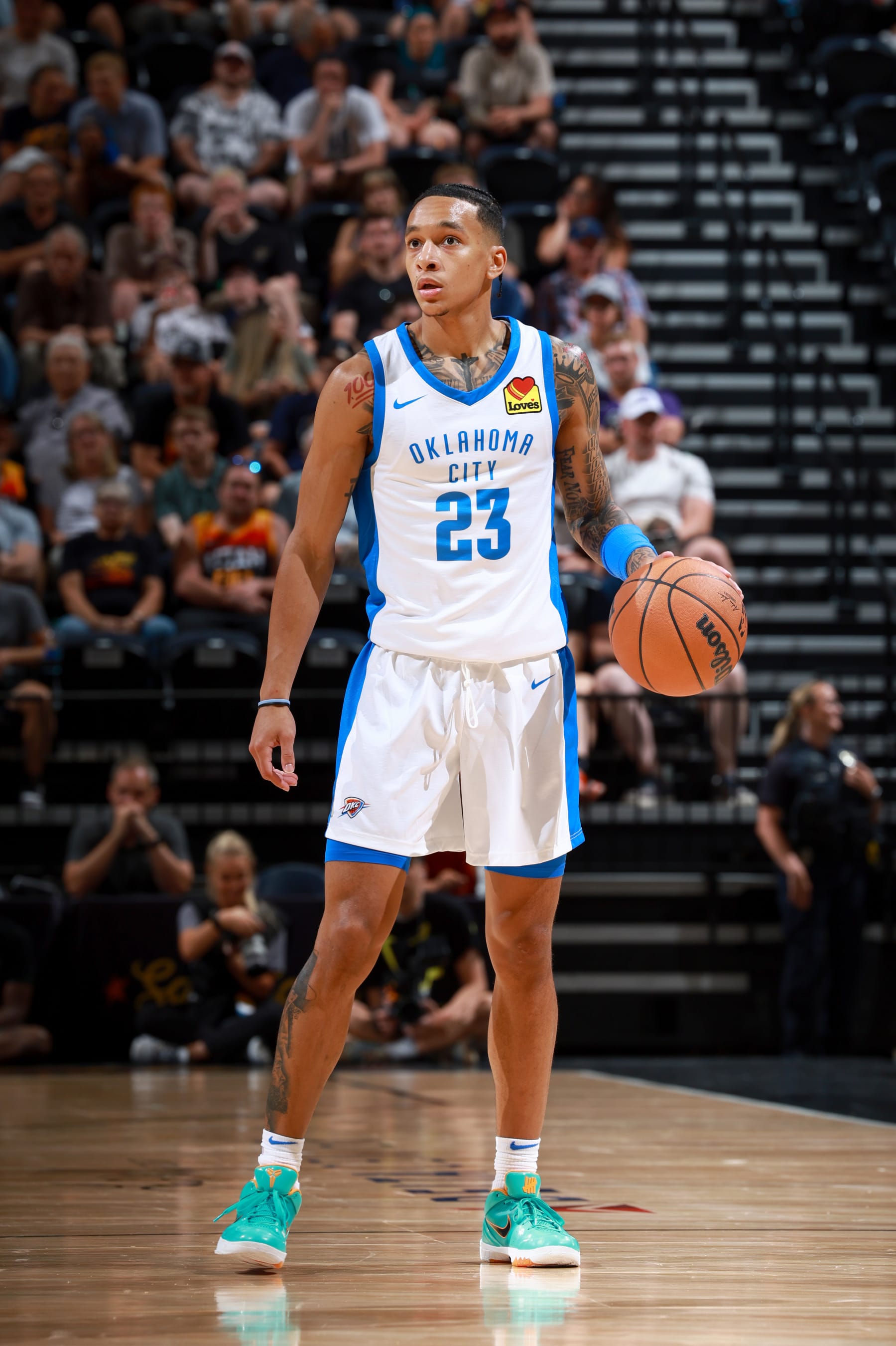 SALT LAKE CITY, UT - JULY 3: Tre Mann #23 of the Oklahoma City Thunder dribbles the ball during the game against the Utah Jazz during the 2023 NBA Salt Lake City Summer League on July 3, 2023 at Delta Center in Salt Lake City, Utah. NOTE TO USER: User expressly acknowledges and agrees that, by downloading and or using this Photograph, User is consenting to the terms and conditions of the Getty Images License Agreement. Mandatory Copyright Notice: Copyright 2023 NBAE (Photo by Melissa Majchrzak/NBAE via Getty Images)