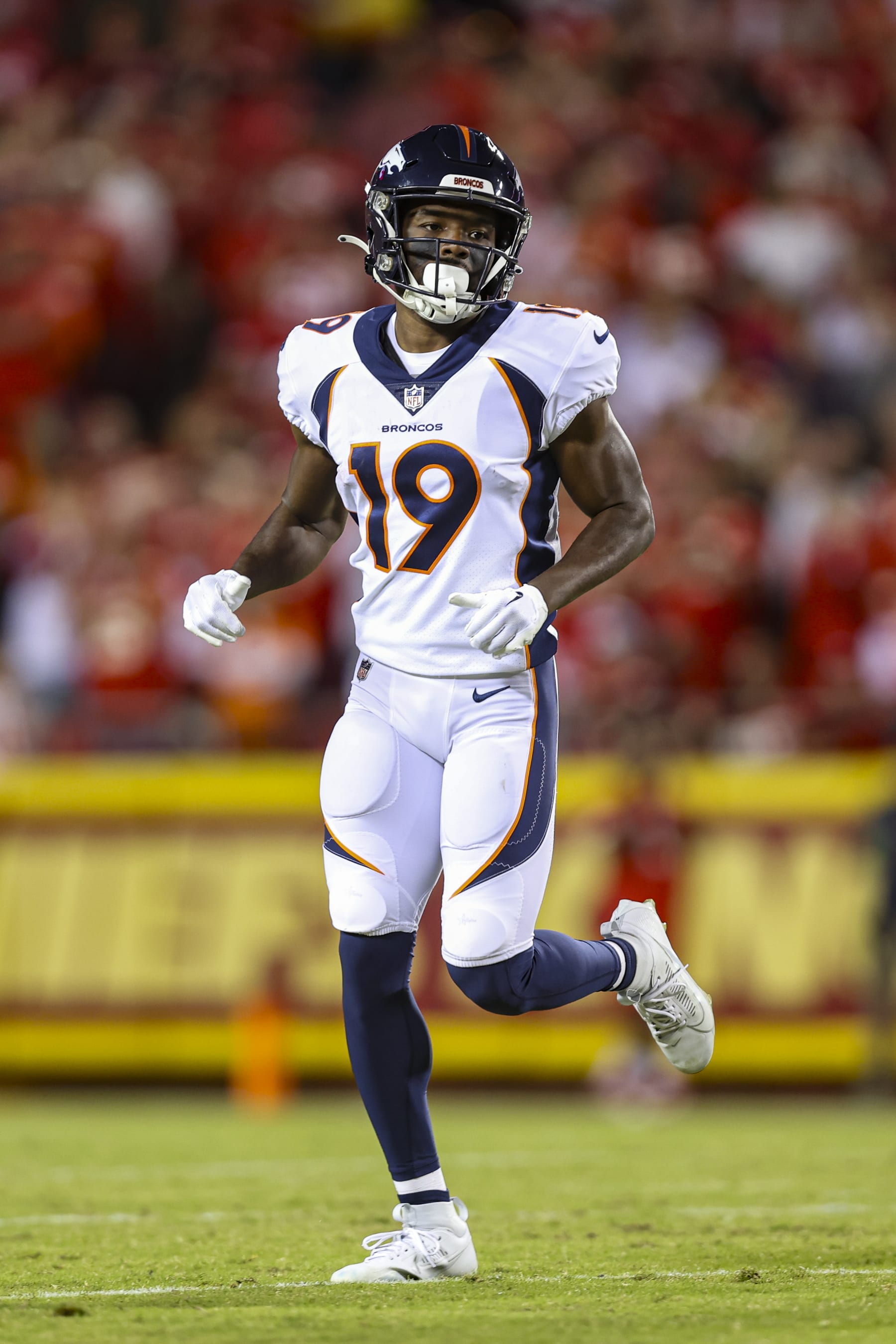 KANSAS CITY, MO - OCTOBER 12: Marvin Mims Jr. #19 of the Denver Broncos looks on from the field during an NFL football game against the Kansas City Chiefs at GEHA Field at Arrowhead Stadium on October 12, 2023 in Kansas City, Missouri. (Photo by Perry Knotts/Getty Images)