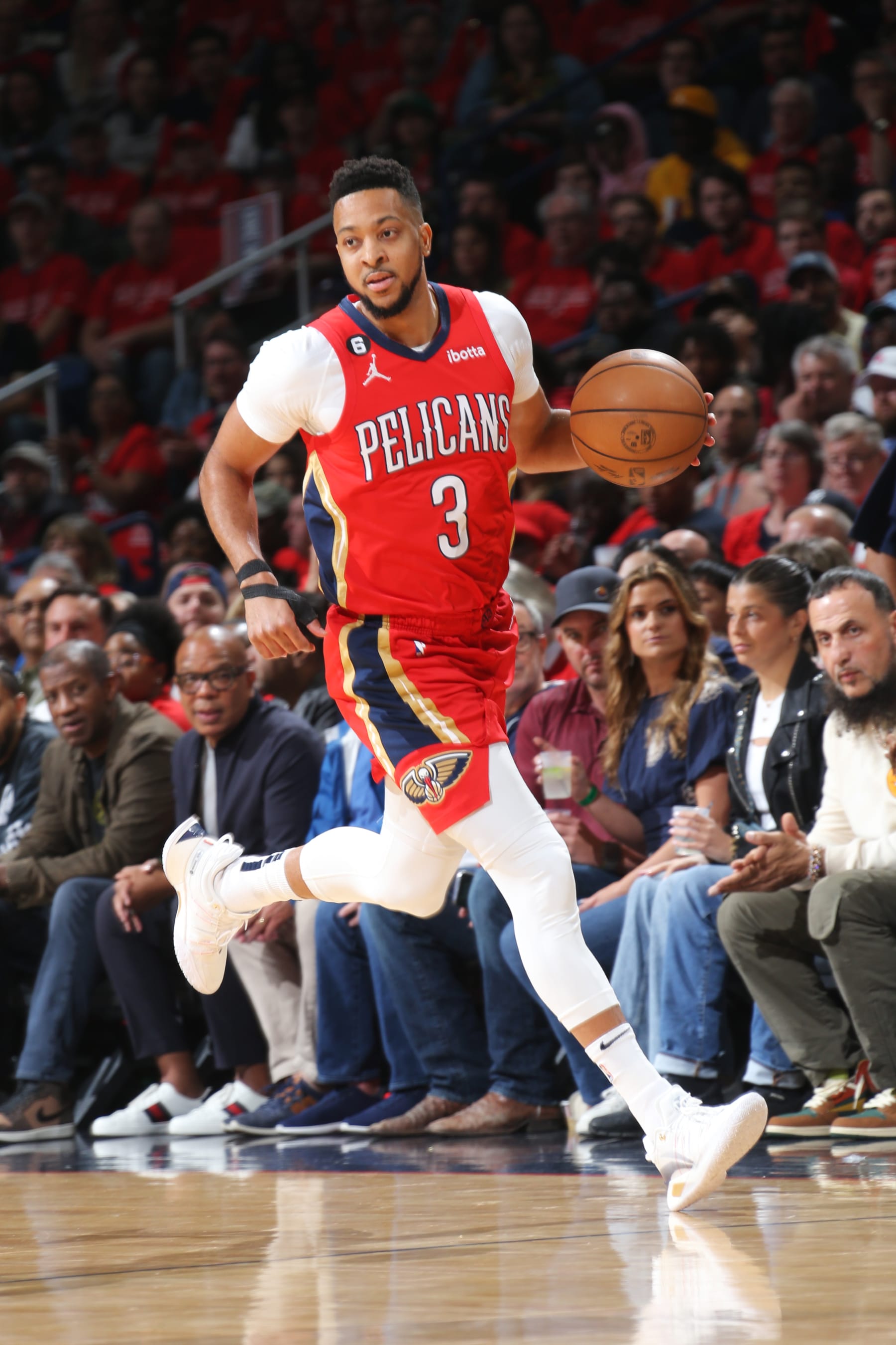 NEW ORLEANS, LA - APRIL 12: CJ McCollum #3 of the New Orleans Pelicans drives to the basket against the Oklahoma City Thunder during the 2023 Play-In Tournament on April 12, 2023 at the Smoothie King Center in New Orleans, Louisiana. NOTE TO USER: User expressly acknowledges and agrees that, by downloading and or using this Photograph, user is consenting to the terms and conditions of the Getty Images License Agreement. Mandatory Copyright Notice: Copyright 2023 NBAE (Photo by Layne Murdoch Jr./NBAE via Getty Images)
