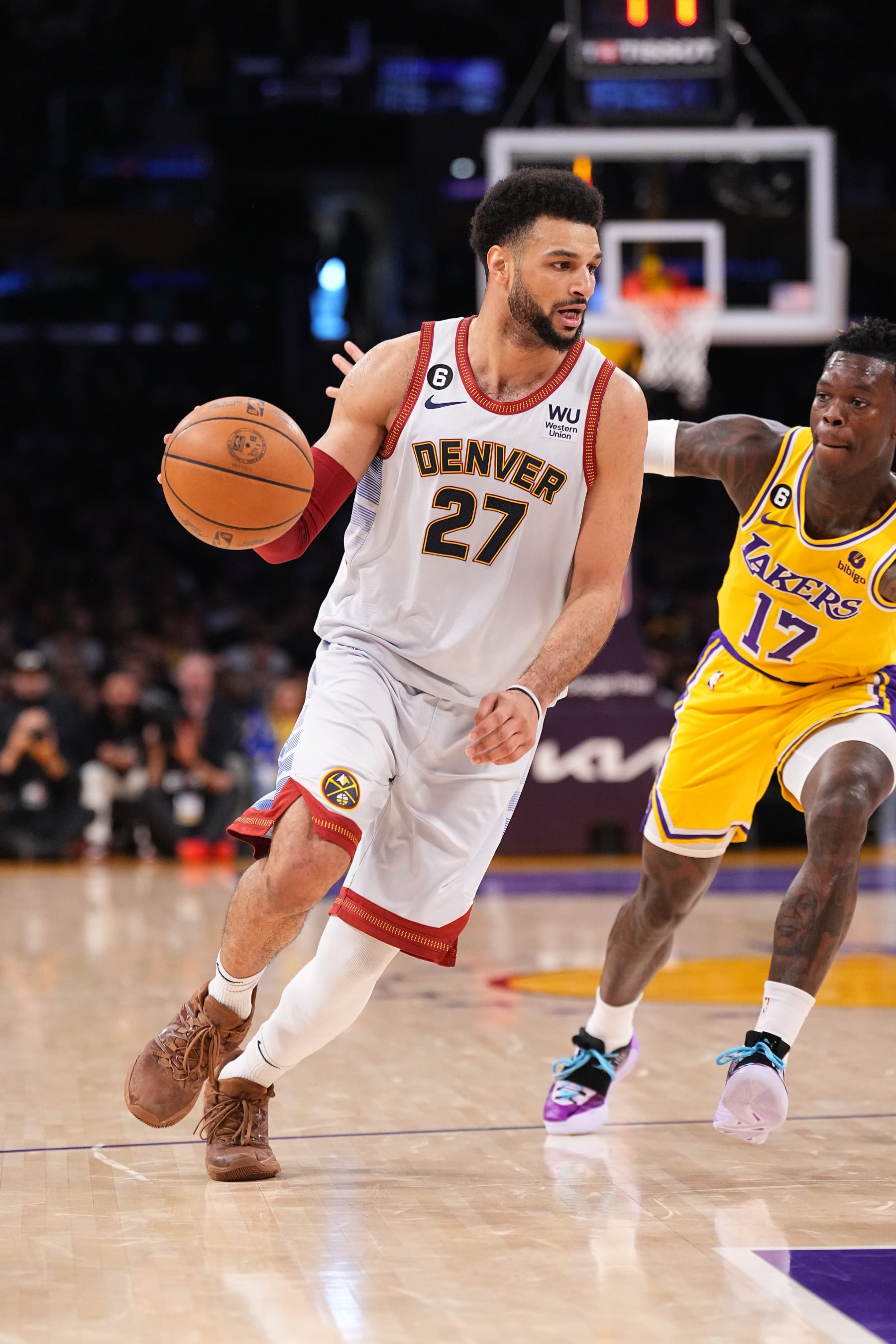 LOS ANGELES, CA - MAY 22: Jamal Murray #27 of the Denver Nuggets dribbles the ball during Game Four of the Western Conference Finals against the Los Angeles Lakers on May 22, 2023 at Crypto.com Arena in Los Angeles, California. NOTE TO USER: User expressly acknowledges and agrees that, by downloading and/or using this Photograph, user is consenting to the terms and conditions of the Getty Images License Agreement. Mandatory Copyright Notice: Copyright 2023 NBAE (Photo by Garrett Ellwood/NBAE via Getty Images)
