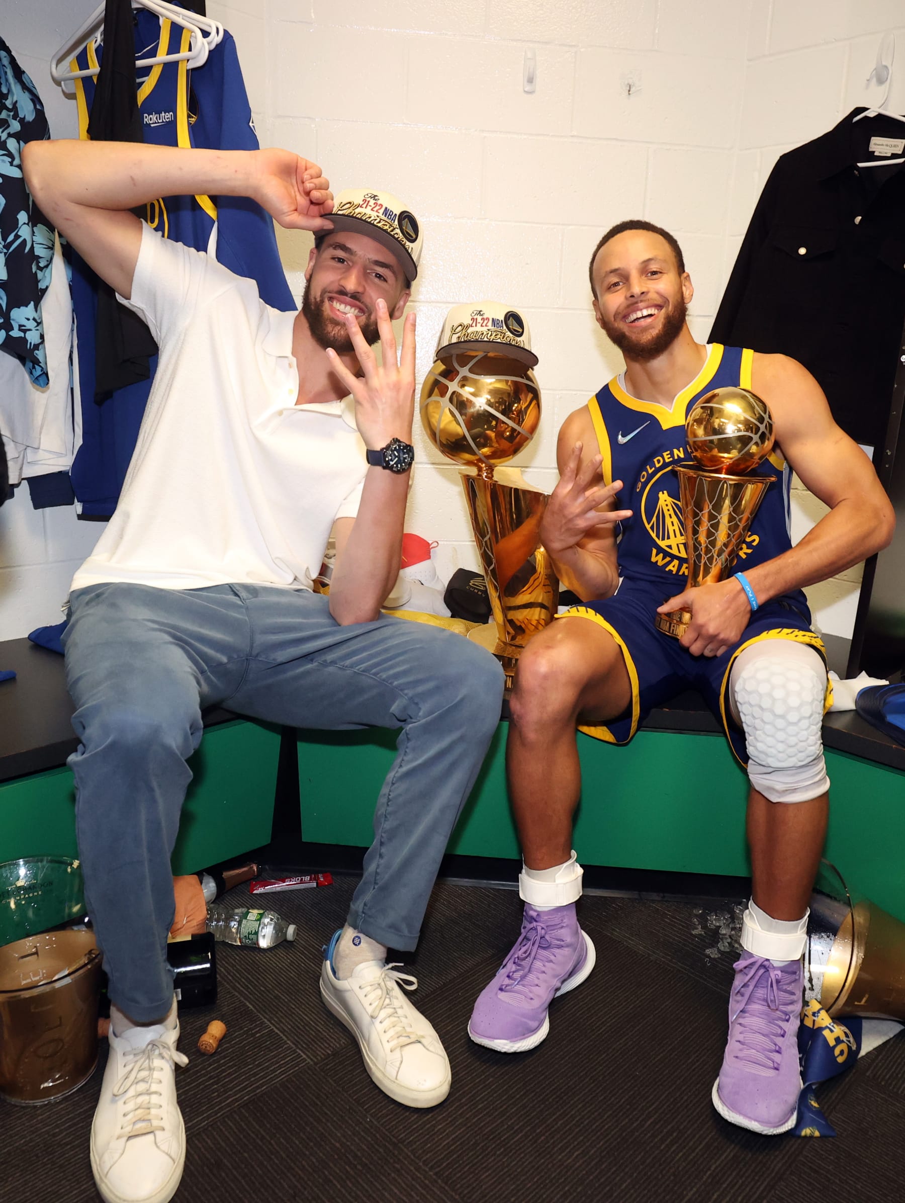 BOSTON, MA - JUNE 16: Klay Thompson #11 and Stephen Curry #30 of the Golden State Warriors pose for a photo with the Larry OBrien Trophy and the Bill Russell NBA Finals MVP Award after Game Six of the 2022 NBA Finals on June 16, 2022 at TD Garden in Boston, Massachusetts. NOTE TO USER: User expressly acknowledges and agrees that, by downloading and or using this photograph, user is consenting to the terms and conditions of Getty Images License Agreement. Mandatory Copyright Notice: Copyright 2022 NBAE (Photo by Nathaniel S. Butler/NBAE via Getty Images)