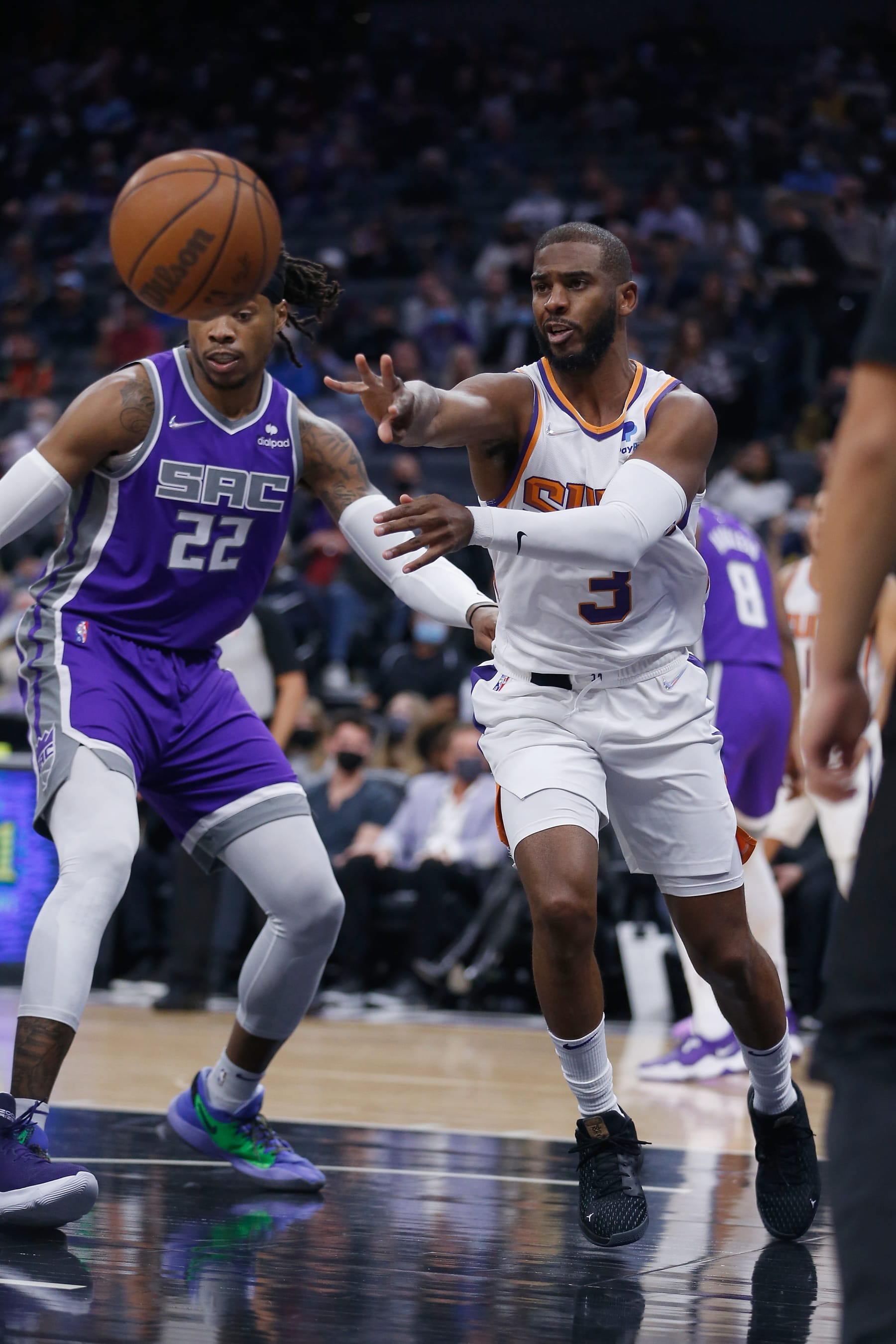 SACRAMENTO, CALIFORNIA - NOVEMBER 08: Chris Paul #3 of the Phoenix Suns passes the ball in the first half against the Sacramento Kings at Golden 1 Center on November 08, 2021 in Sacramento, California. NOTE TO USER: User expressly acknowledges and agrees that, by downloading and/or using this photograph, User is consenting to the terms and conditions of the Getty Images License Agreement. (Photo by Lachlan Cunningham/Getty Images)
