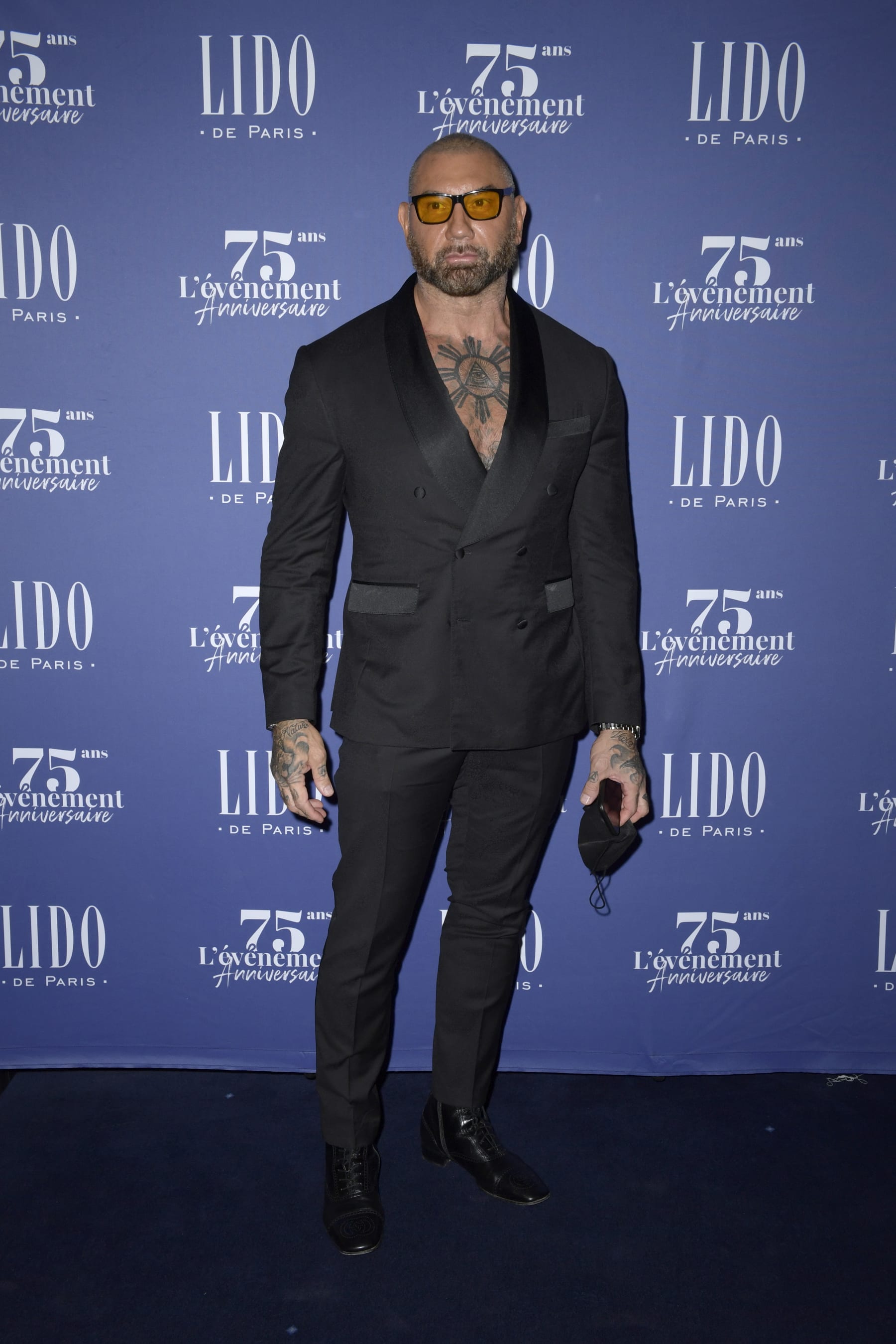PARIS, FRANCE - SEPTEMBER 18: Dave Bautista attends Le Lido on September 18, 2021 in Paris, France. Paris' world-famous cabaret venue Le Lido, celebrating their 75th anniversary has been closed due to the Covid-19 pandemic. The dancers perform again in the show “Paris Merveilles” produced and directed by Franco Dragone. Over 1100 guests can attend the show  (Photo by Kristy Sparow/Getty Images )