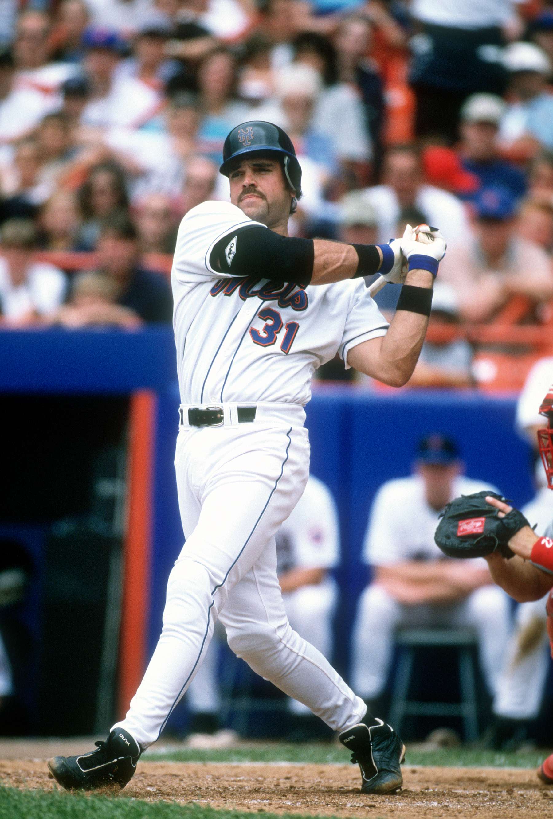 NEW YORK - CIRCA 2000: Mike Piazza #31 of the New York Mets bats during a Major League Baseball game circa 2000 at Shea Stadium in the Queens borough of New York City. Piazza played for the Mets from 1998-2005. (Photo by Focus on Sport/Getty Images)