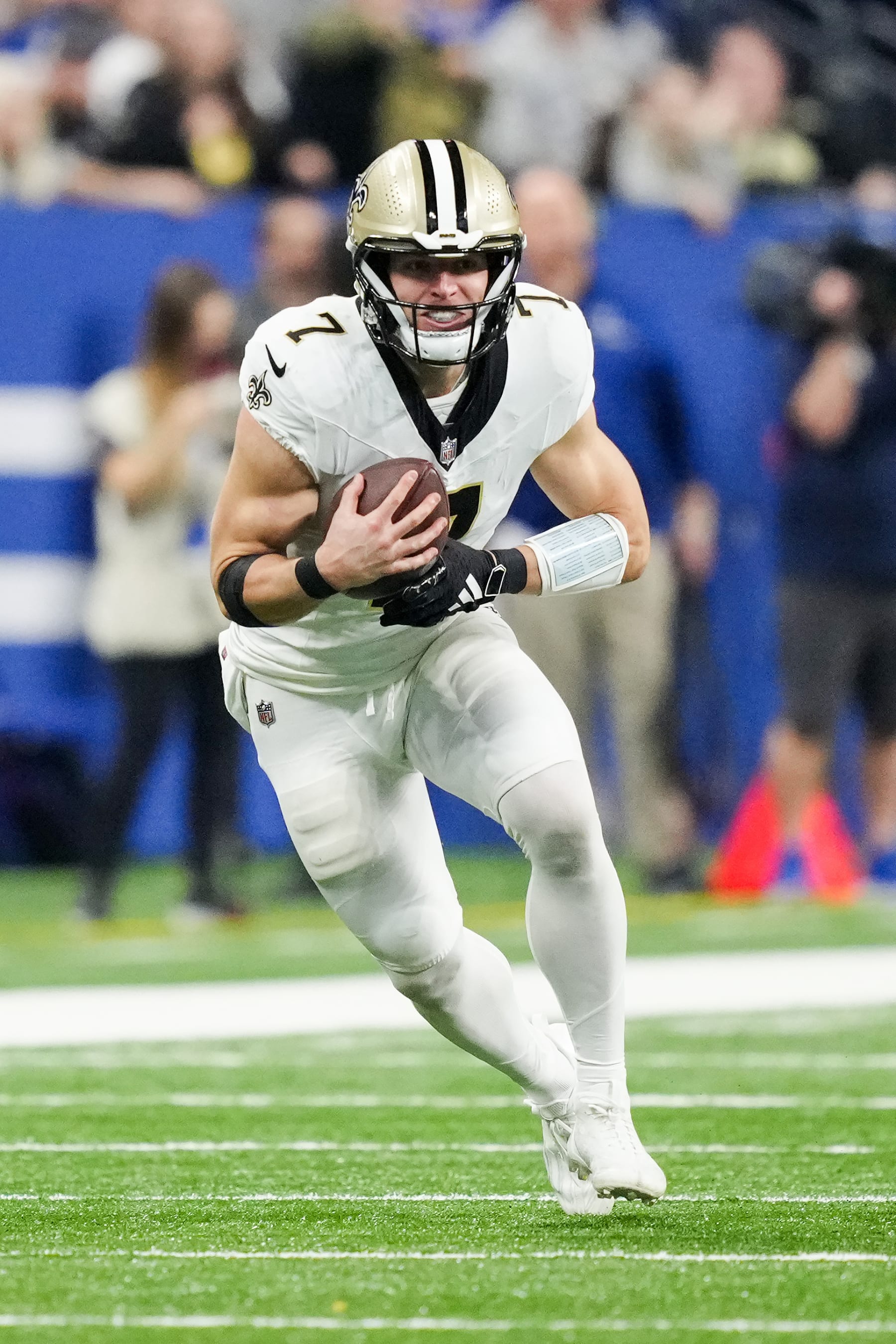 INDIANAPOLIS, INDIANA - OCTOBER 29: Taysom Hill #7 of the New Orleans Saints runs with the ball in the third quarter against the Indianapolis Colts at Lucas Oil Stadium on October 29, 2023 in Indianapolis, Indiana. (Photo by Dylan Buell/Getty Images)