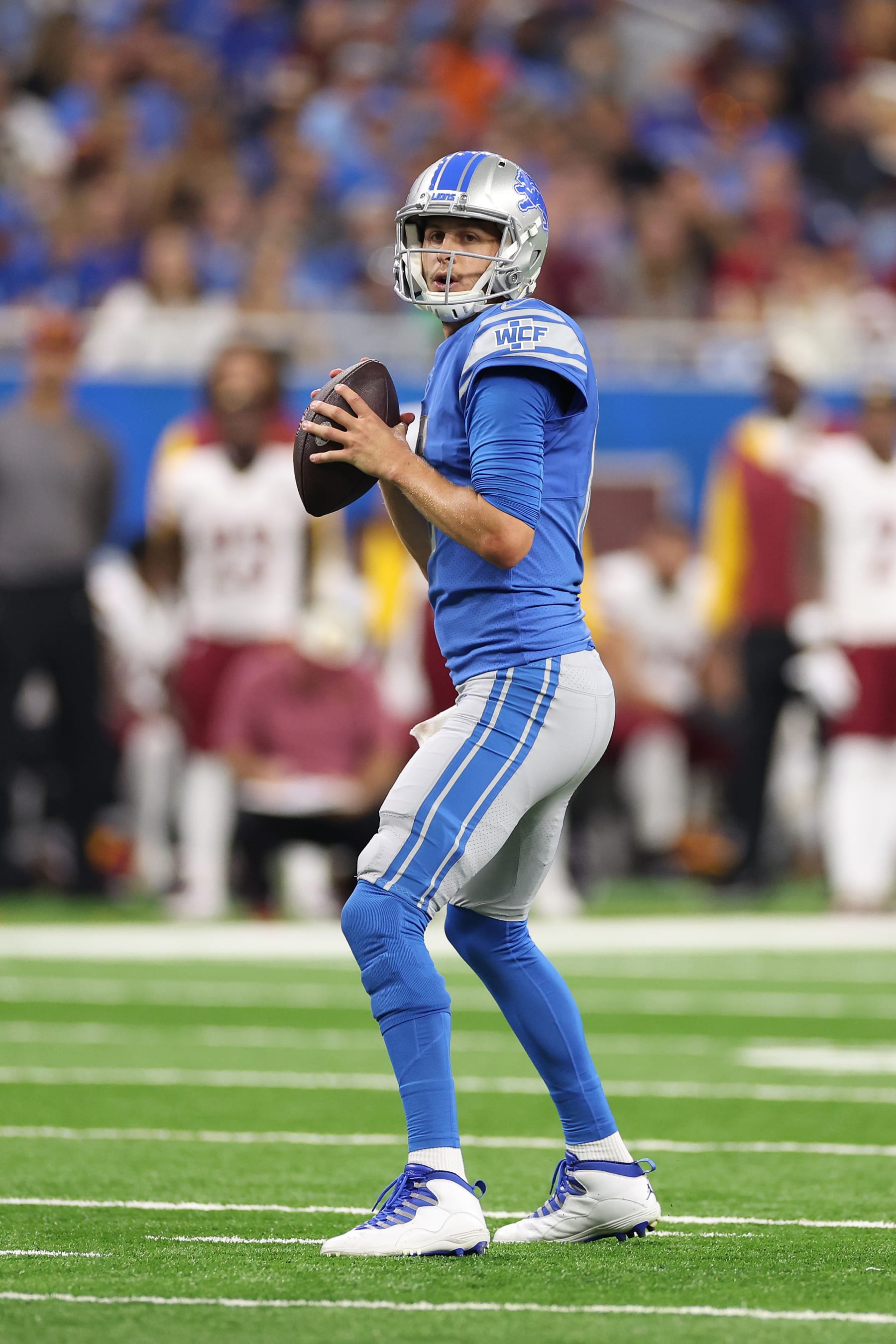DETROIT, MICHIGAN - SEPTEMBER 18: Jared Goff #16 of the Detroit Lions plays against the Washington Commanders at Ford Field on September 18, 2022 in Detroit, Michigan. (Photo by Gregory Shamus/Getty Images)