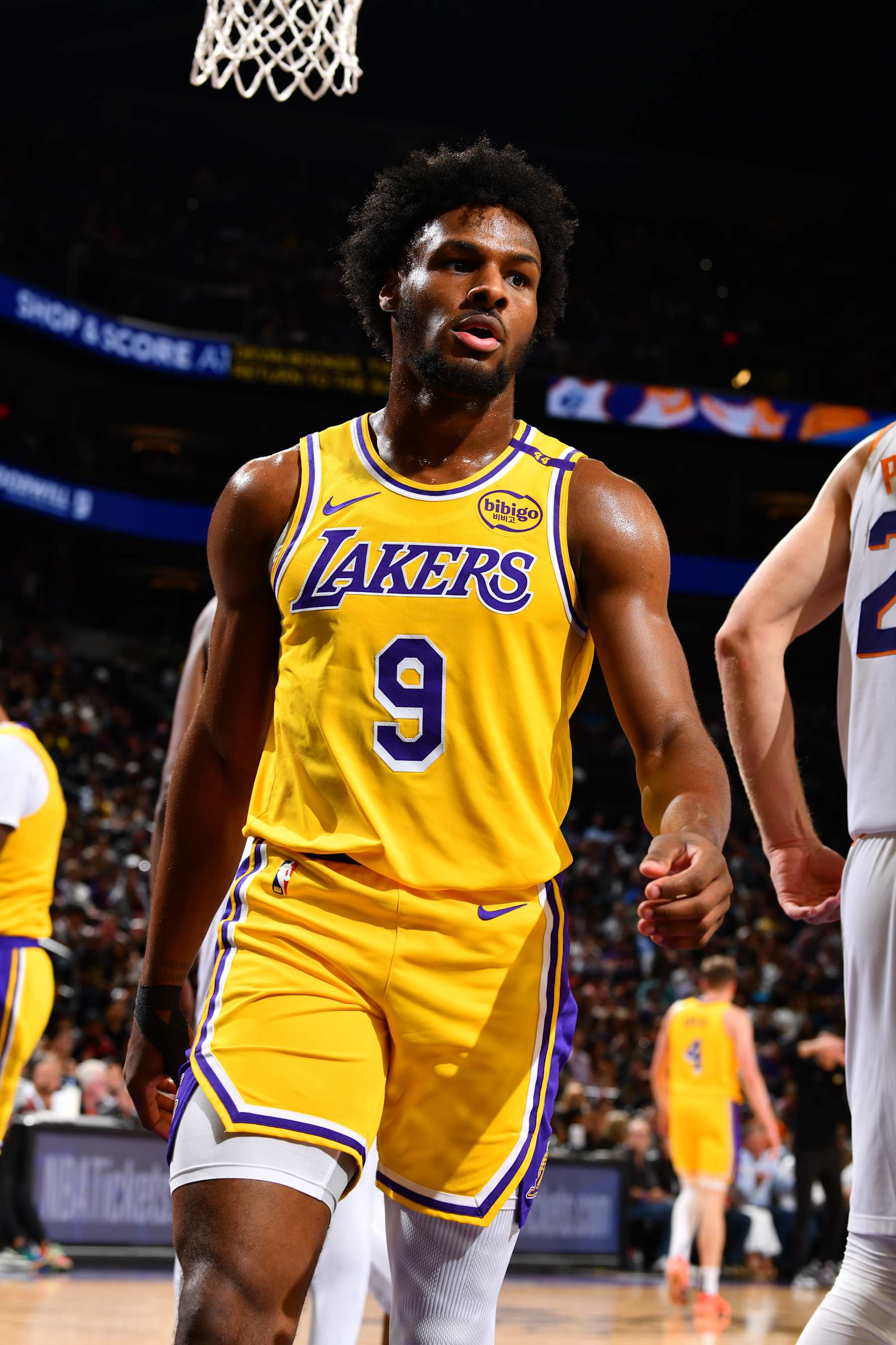 PHOENIX, AZ - OCTOBER 17: Bronny James #9 of the Los Angeles Lakers looks on during the game against the Phoenix Suns during a NBA Preseason game on October 17, 2024 at Footprint Center in Phoenix, Arizona. NOTE TO USER: User expressly acknowledges and agrees that, by downloading and or using this photograph, user is consenting to the terms and conditions of the Getty Images License Agreement. Mandatory Copyright Notice: Copyright 2024 NBAE (Photo by Barry Gossage/NBAE via Getty Images)