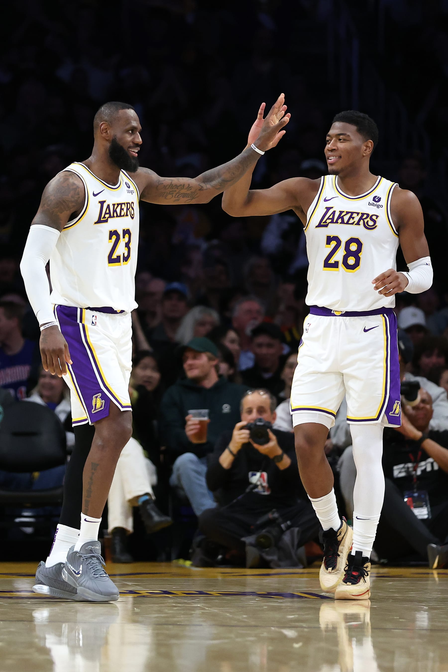 LOS ANGELES, CALIFORNIA - MARCH 16: LeBron James #23  is congratulated by Rui Hachimura #28 of the Los Angeles Lakers after a three point shot during the second half of a game against the Golden State Warriors at Crypto.com Arena on March 16, 2024 in Los Angeles, California. NOTE TO USER: User expressly acknowledges and agrees that, by downloading and or using this photograph, User is consenting to the terms and conditions of the Getty Images License Agreement. (Photo by Sean M. Haffey/Getty Images)