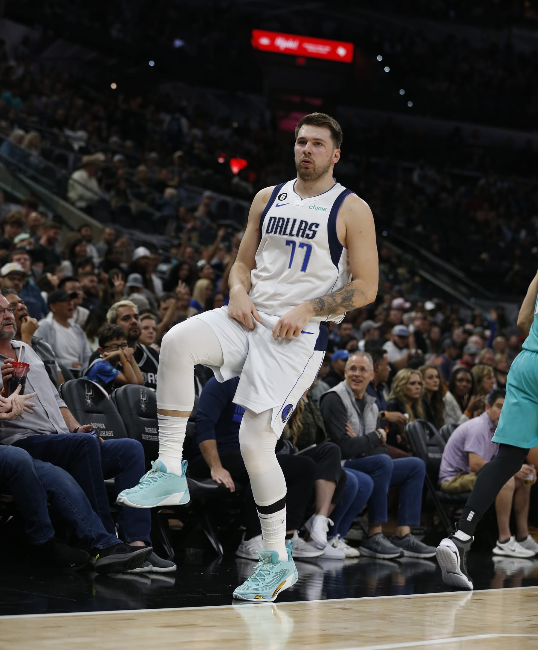 SAN ANTONIO, TX - DECEMBER 31: Luka Doncic #77 of the Dallas Mavericks does a little dance after hitting a three against the San Antonio Spurs in the first half at AT&T Center on December 31, 2022 in San Antonio, Texas. NOTE TO USER: User expressly acknowledges and agrees that, by downloading and or using this photograph, User is consenting to terms and conditions of the Getty Images License Agreement. (Photo by Ronald Cortes/Getty Images)