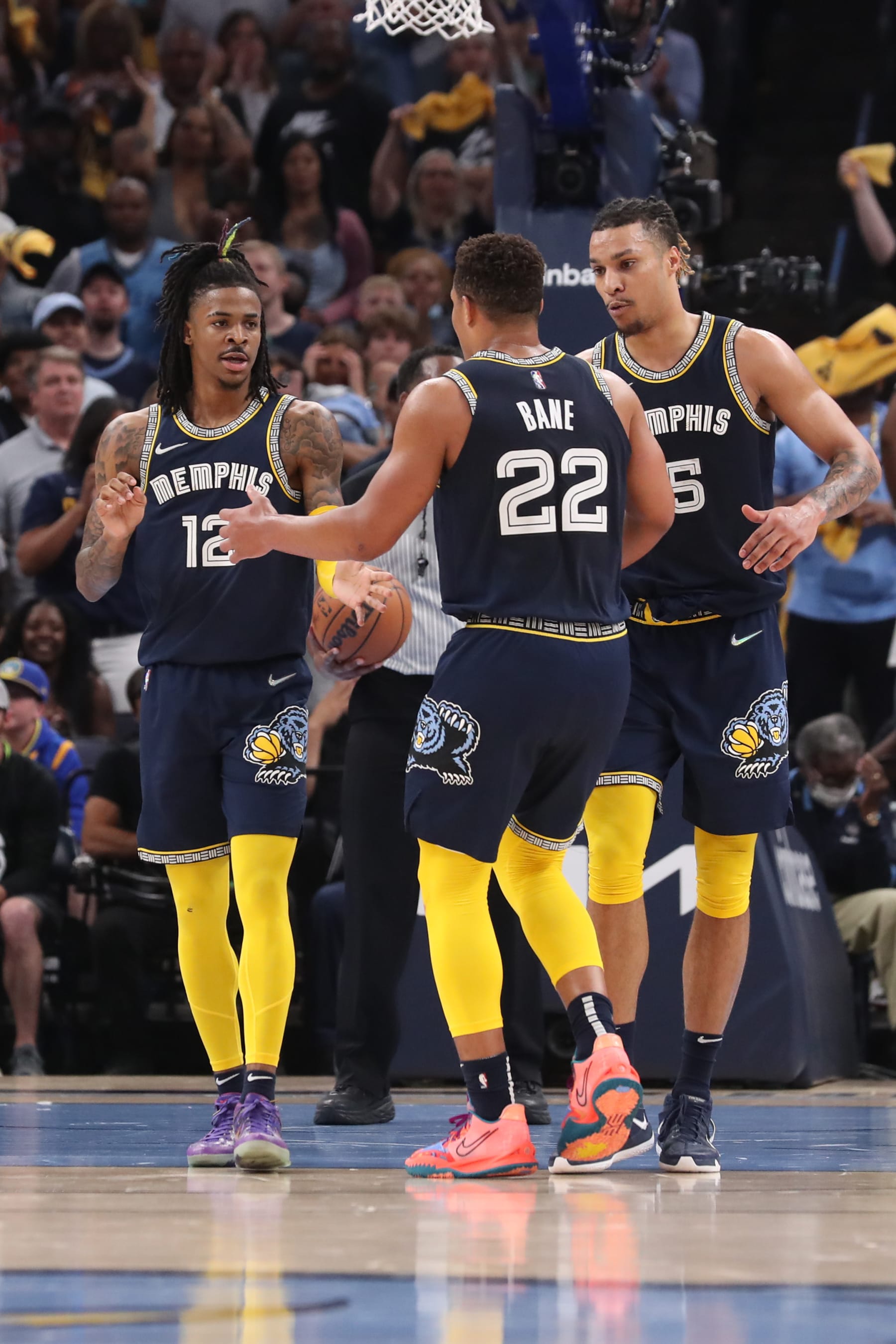 MEMPHIS, TN - MAY 3: Ja Morant #12 of the Memphis Grizzlies high fives Desmond Bane #22 of the Memphis Grizzlies during Game 2 of the 2022 NBA Playoffs Western Conference Semifinals on May 3, 2022 at FedExForum in Memphis, Tennessee. NOTE TO USER: User expressly acknowledges and agrees that, by downloading and or using this photograph, User is consenting to the terms and conditions of the Getty Images License Agreement. Mandatory Copyright Notice: Copyright 2022 NBAE (Photo by Joe Murphy/NBAE via Getty Images)