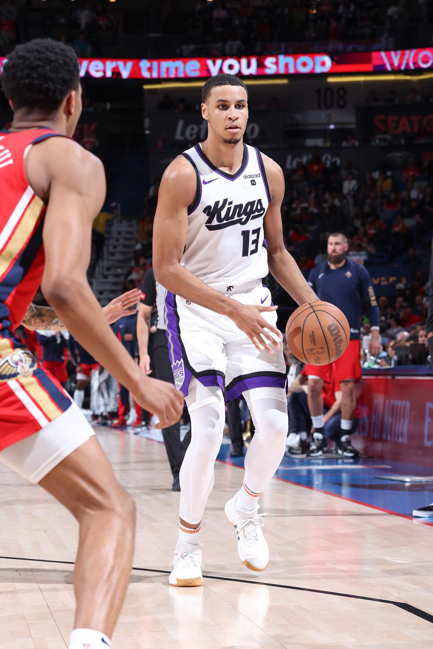 NEW ORLEANS, LA - APRIL 19:  Keegan Murray #13 of the Sacramento Kings handles the ball during the game  against the New Orleans Pelicans during the 2024 Play-In Tournament on April 19, 2024 at the Smoothie King Center in New Orleans, Louisiana. NOTE TO USER: User expressly acknowledges and agrees that, by downloading and or using this Photograph, user is consenting to the terms and conditions of the Getty Images License Agreement. Mandatory Copyright Notice: Copyright 2024 NBAE (Photo by Jeff Haynes./NBAE via Getty Images)