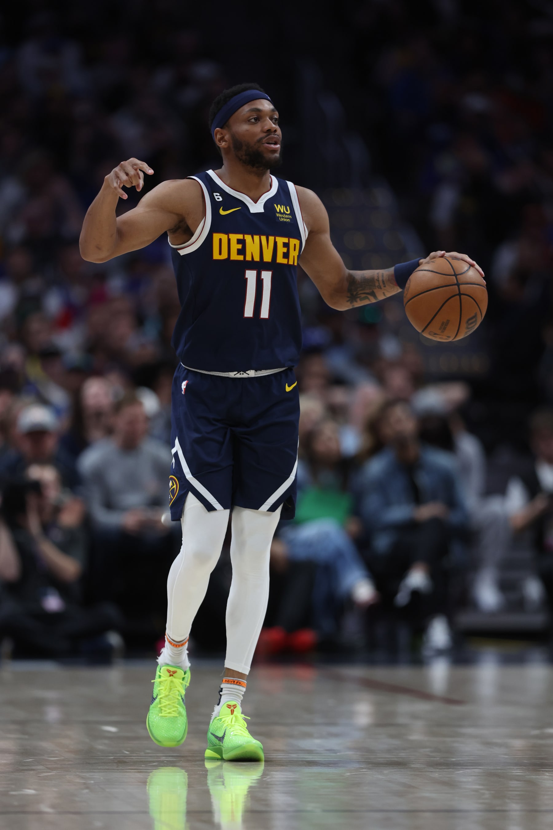 DENVER, COLORADO - MAY 18: Bruce Brown #11 of the Denver Nuggets brings the ball up the court during the third quarter against the Los Angeles Lakers in game two of the Western Conference Finals at Ball Arena on May 18, 2023 in Denver, Colorado. NOTE TO USER: User expressly acknowledges and agrees that, by downloading and or using this photograph, User is consenting to the terms and conditions of the Getty Images License Agreement. (Photo by Matthew Stockman/Getty Images)