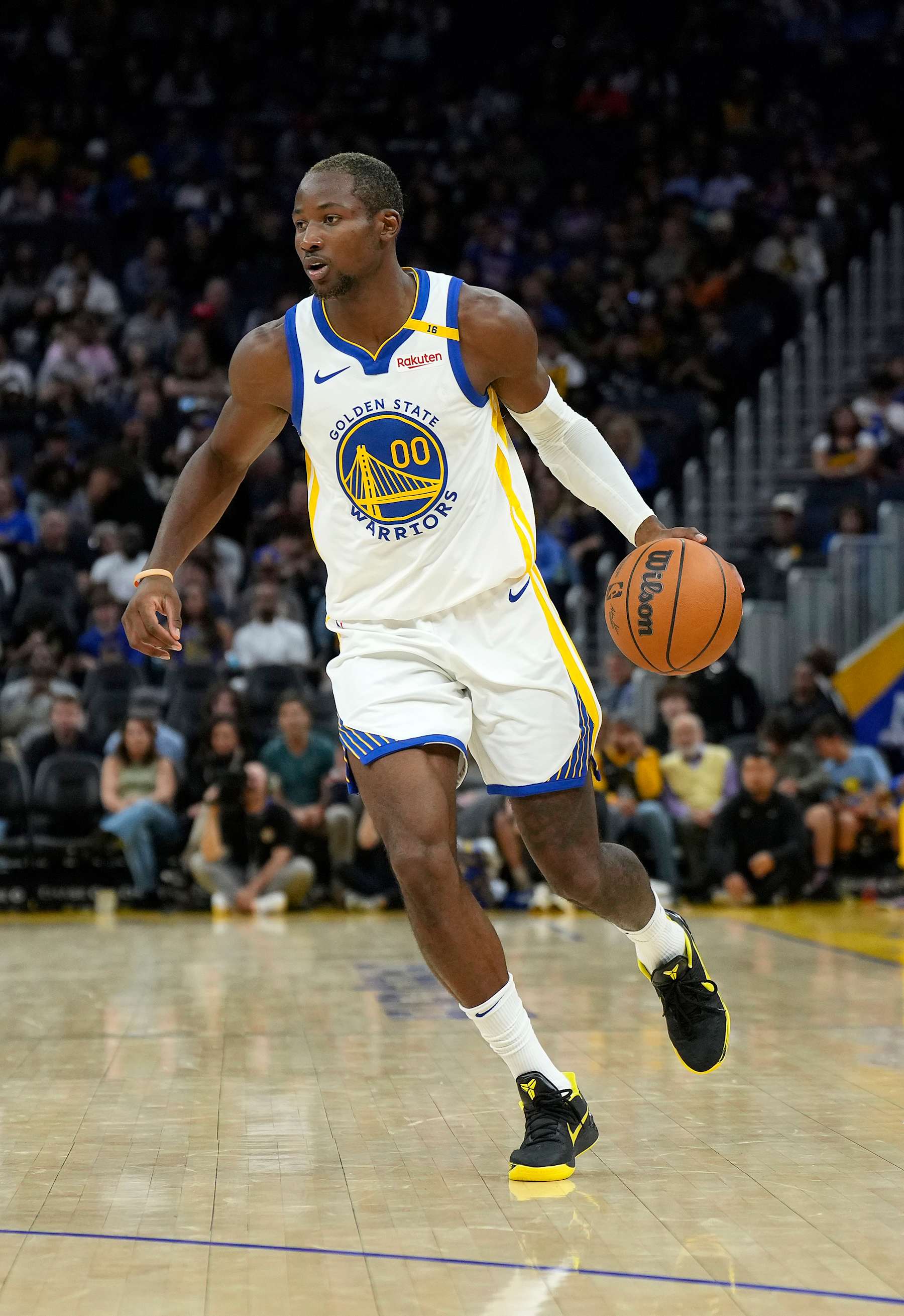 SAN FRANCISCO, CALIFORNIA - OCTOBER 13: Jonathan Kuminga #00 of the Golden State Warriors dribbles the ball against the Detroit Pistons during the second half of an NBA preseason basketball game at Chase Center on October 13, 2024 in San Francisco, California. NOTE TO USER: User expressly acknowledges and agrees that, by downloading and or using this photograph, User is consenting to the terms and conditions of the Getty Images License Agreement. (Photo by Thearon W. Henderson/Getty Images)