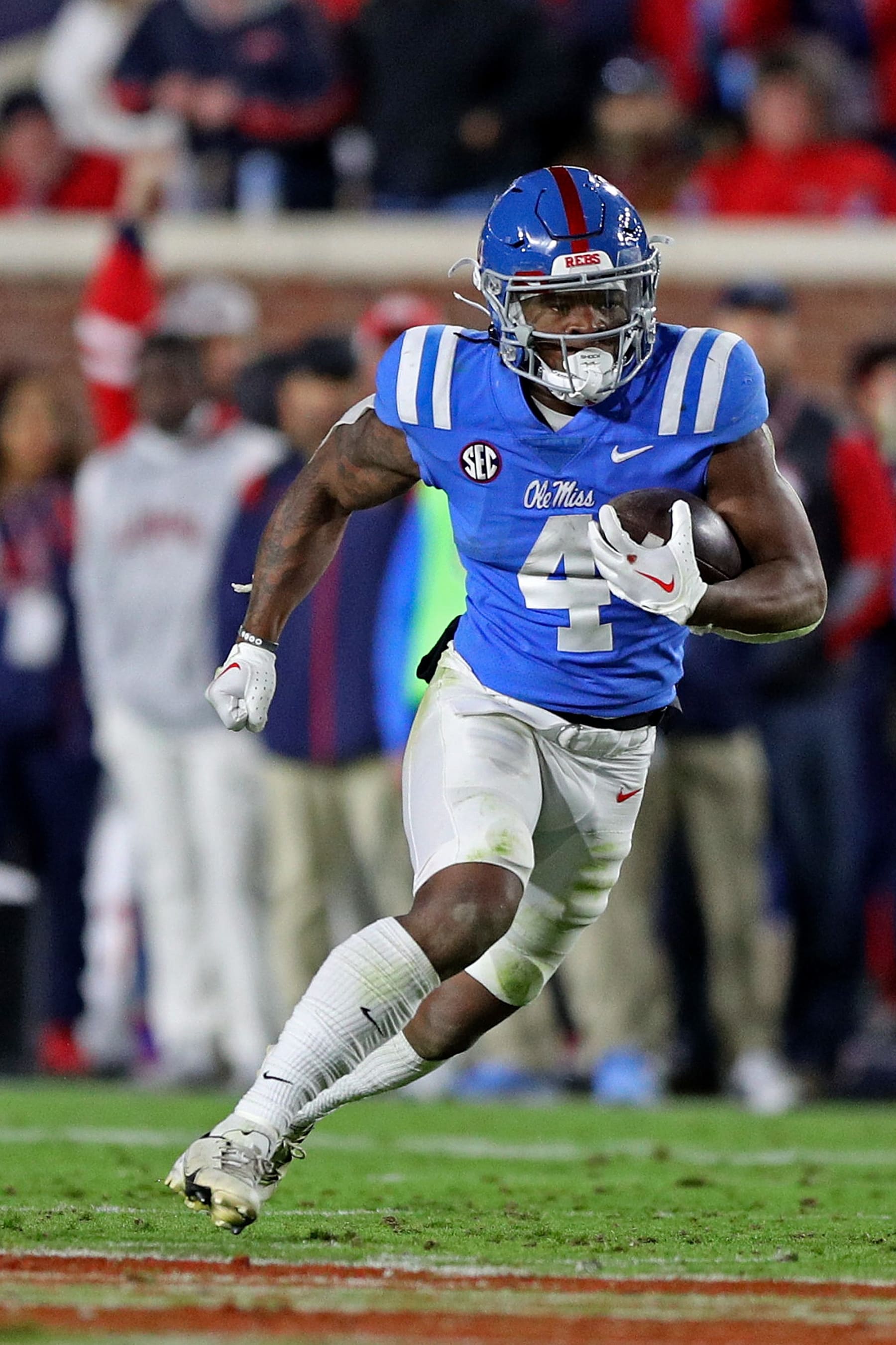 OXFORD, MISSISSIPPI - NOVEMBER 12: Quinshon Judkins #4 of the Mississippi Rebels carries the ball during the game against the Alabama Crimson Tide at Vaught-Hemingway Stadium on November 12, 2022 in Oxford, Mississippi. (Photo by Justin Ford/Getty Images)