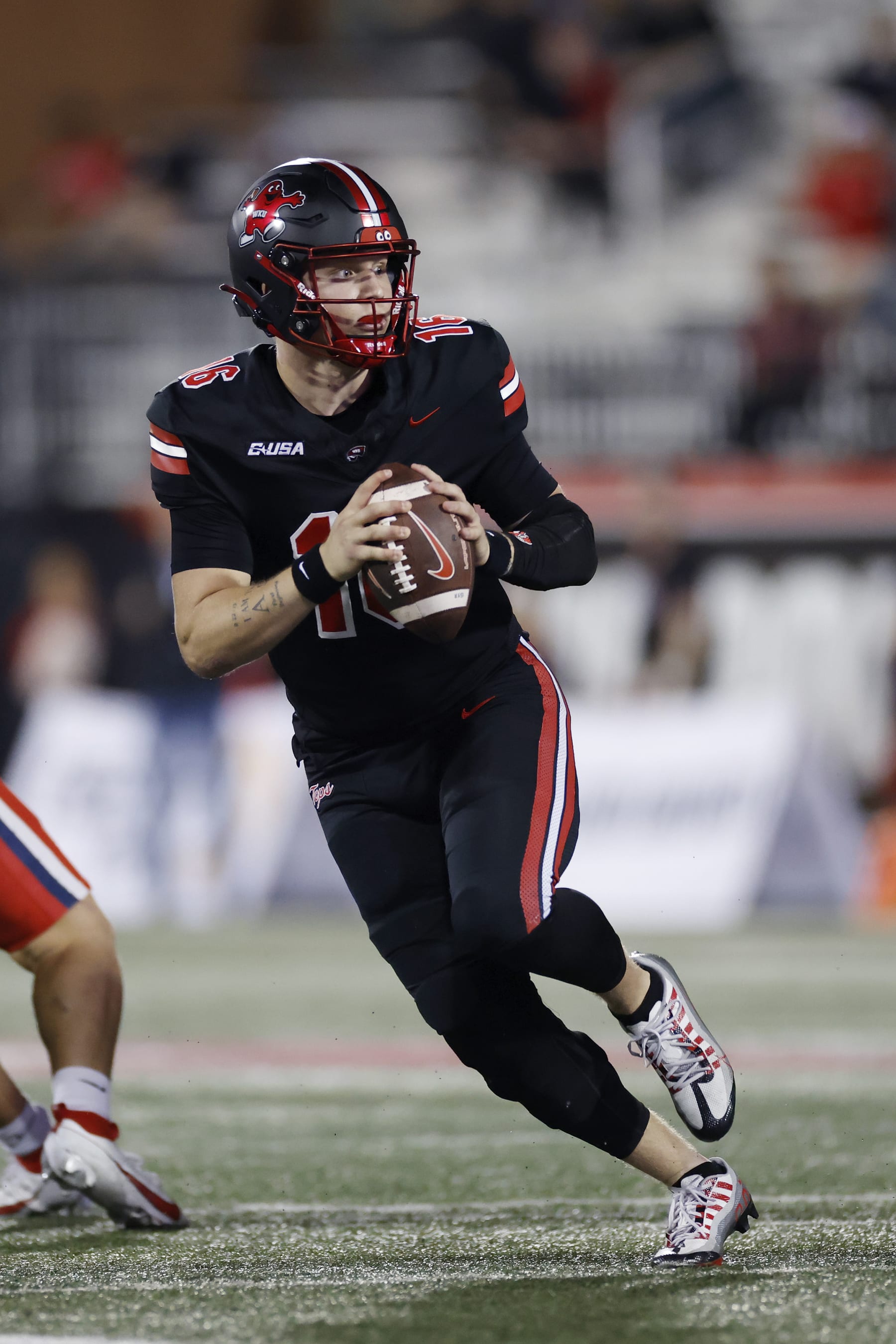BOWLING GREEN, KY - OCTOBER 24: Western Kentucky Hilltoppers quarterback Austin Reed (16) looks to pass the ball during a college football game against the Liberty Flames on October 24, 2023 at Houchens Industries - L. T. Smith Stadium in Bowling Green, Kentucky. (Photo by Joe Robbins/Icon Sportswire via Getty Images)