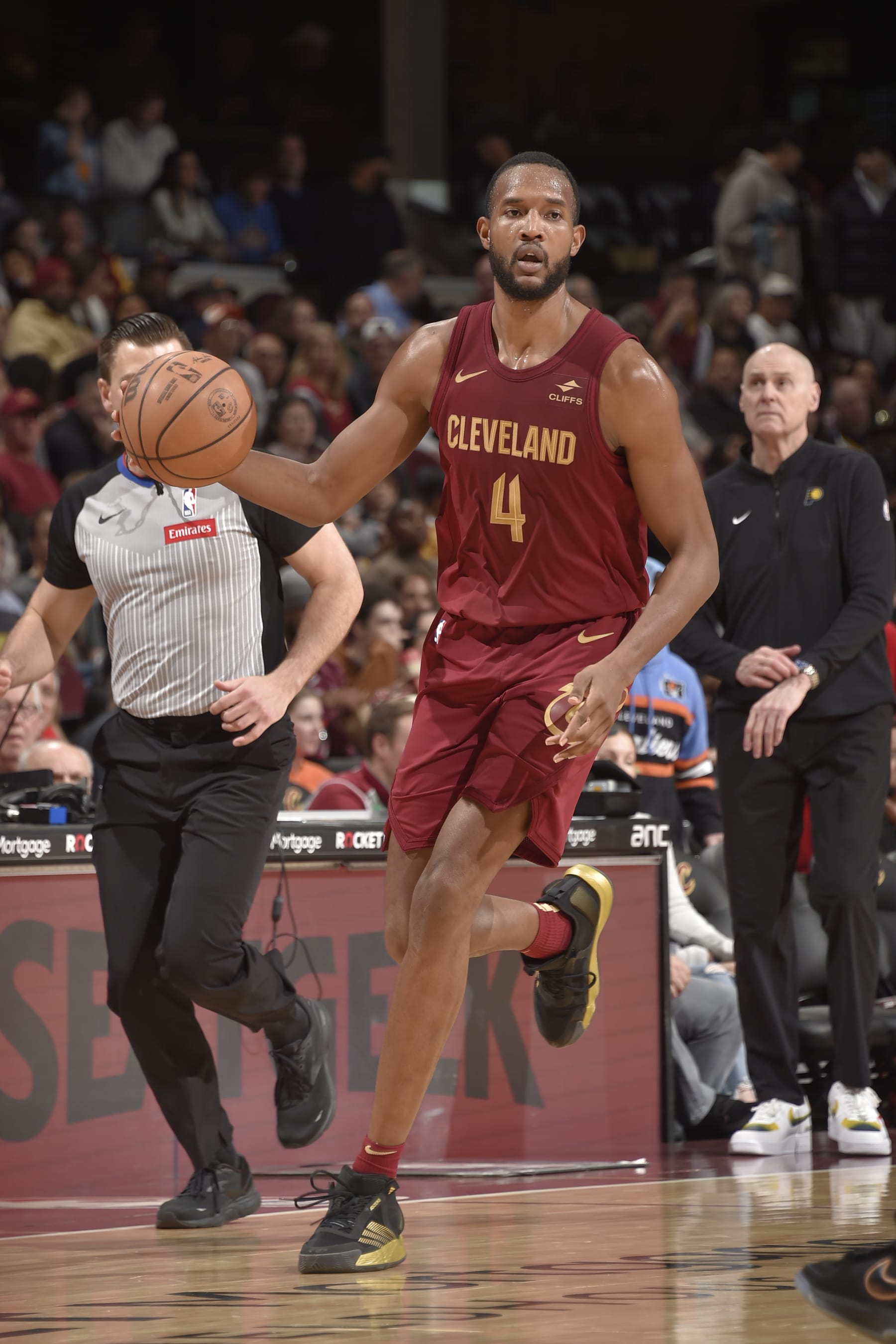 CLEVELAND, OH - APRIL 12: Evan Mobley #4 of the Cleveland Cavaliers dribbles the ball during the game against the Indiana Pacers on April 12, 2024 at Rocket Mortgage FieldHouse in Cleveland, Ohio. NOTE TO USER: User expressly acknowledges and agrees that, by downloading and/or using this Photograph, user is consenting to the terms and conditions of the Getty Images License Agreement. Mandatory Copyright Notice: Copyright 2024 NBAE (Photo by David Liam Kyle/NBAE via Getty Images)