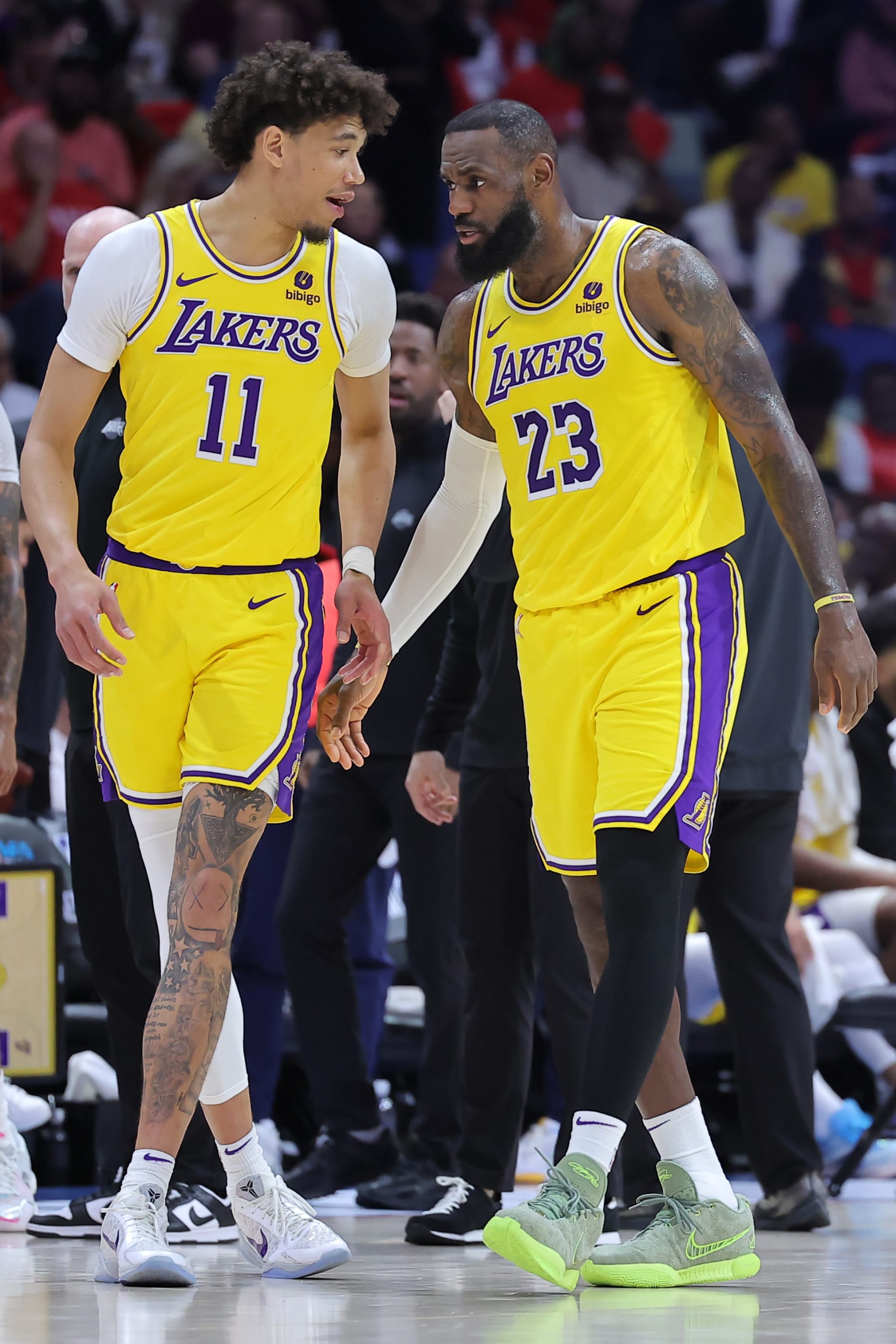 NEW ORLEANS, LOUISIANA - APRIL 16: Jaxson Hayes #11 and LeBron James #23 of the Los Angeles Lakers react against the New Orleans Pelicans during a play-in tournament game at the Smoothie King Center on April 16, 2024 in New Orleans, Louisiana. NOTE TO USER: User expressly acknowledges and agrees that, by downloading and or using this Photograph, user is consenting to the terms and conditions of the Getty Images License Agreement. (Photo by Jonathan Bachman/Getty Images)