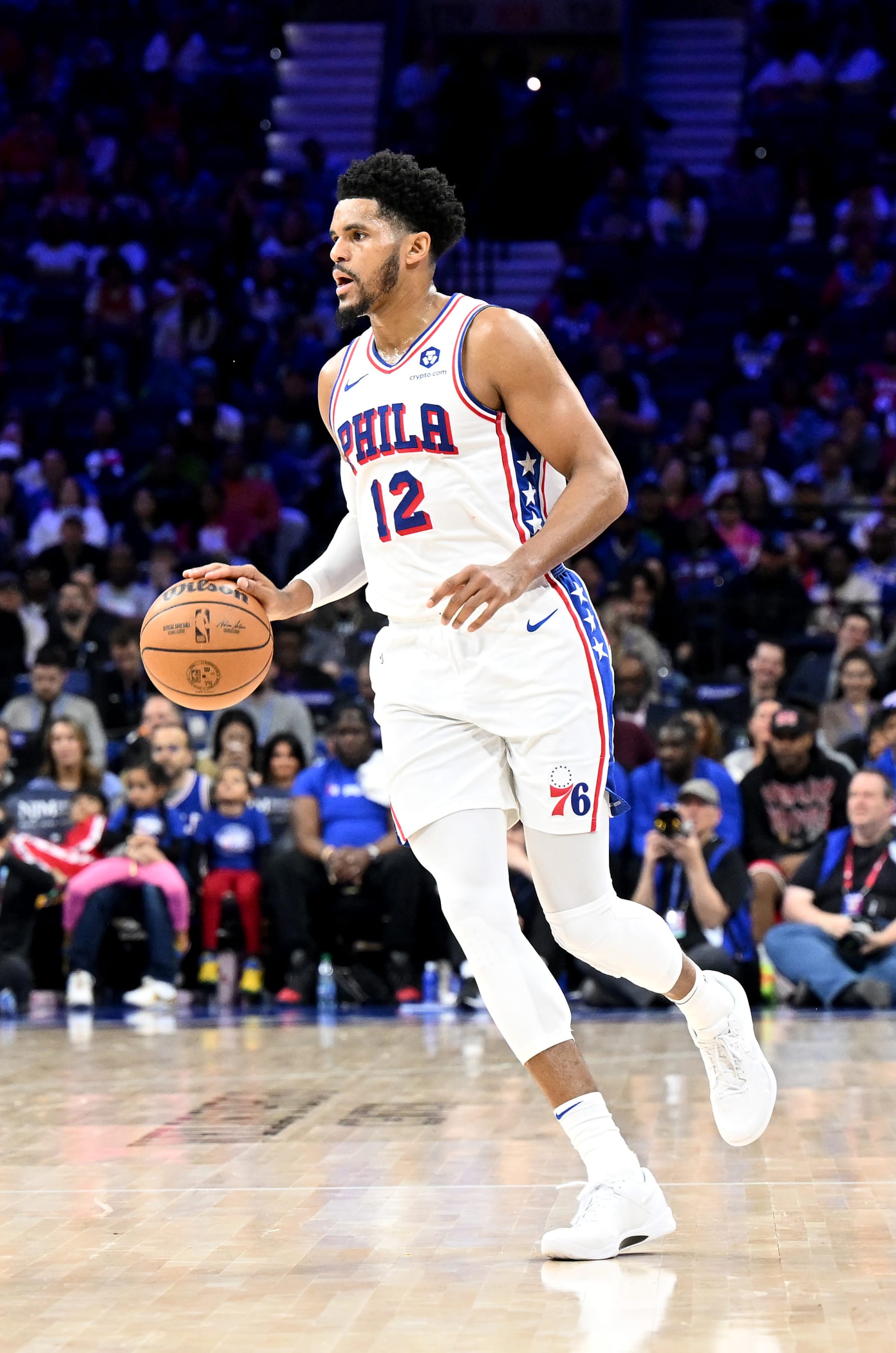 PHILADELPHIA, PENNSYLVANIA - APRIL 14: Tobias Harris #12 of the Philadelphia 76ers handles the ball against the Brooklyn Nets at the Wells Fargo Center on April 14, 2024 in Philadelphia, Pennsylvania.  NOTE TO USER: User expressly acknowledges and agrees that, by downloading and or using this photograph, User is consenting to the terms and conditions of the Getty Images License Agreement. (Photo by G Fiume/Getty Images)