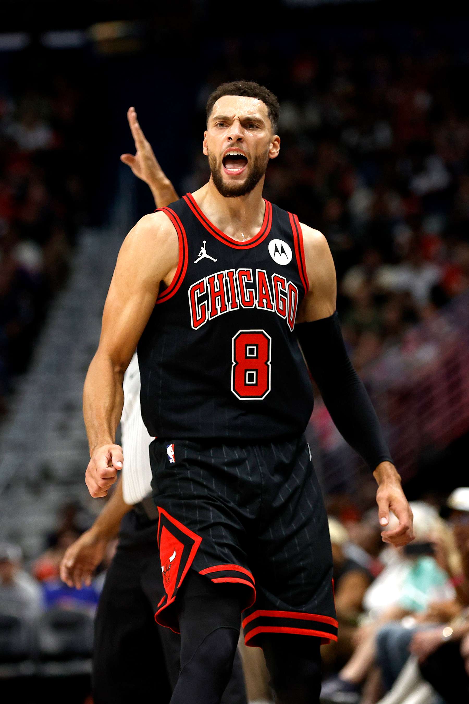 NEW ORLEANS, LOUISIANA - OCTOBER 23: Zach LaVine #8 of the Chicago Bulls reacts after scoring a three point basket during the second quarter of an NBA game against the New Orleans Pelicans at Smoothie King Center on October 23, 2024 in New Orleans, Louisiana. NOTE TO USER: User expressly acknowledges and agrees that, by downloading and or using this photograph, User is consenting to the terms and conditions of the Getty Images License Agreement. (Photo by Sean Gardner/Getty Images)