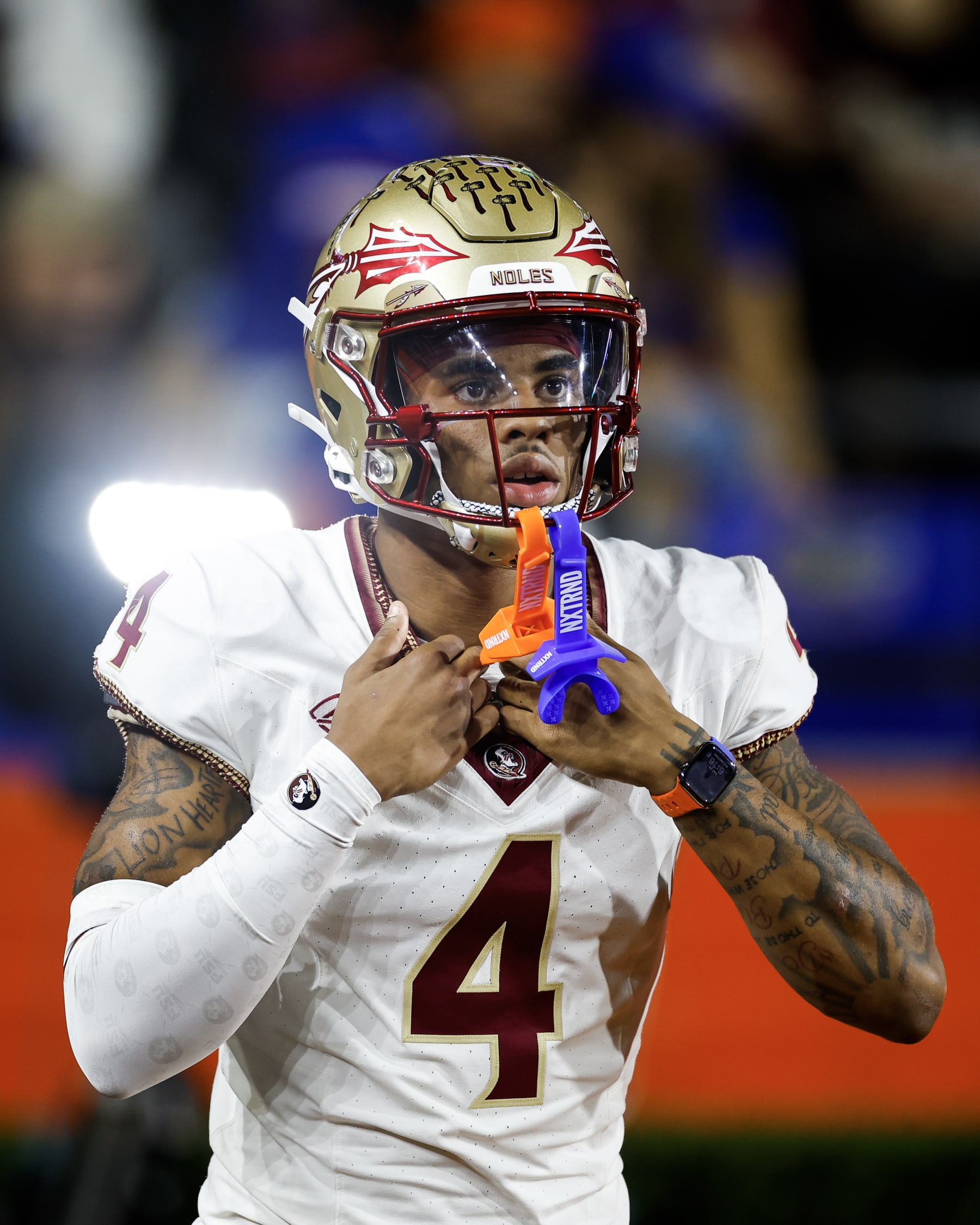 GAINESVILLE, FLORIDA - NOVEMBER 25: Keon Coleman #4 of the Florida State Seminoles warms up before the start of a game against the Florida Gators at Ben Hill Griffin Stadium on November 25, 2023 in Gainesville, Florida. (Photo by James Gilbert/Getty Images)