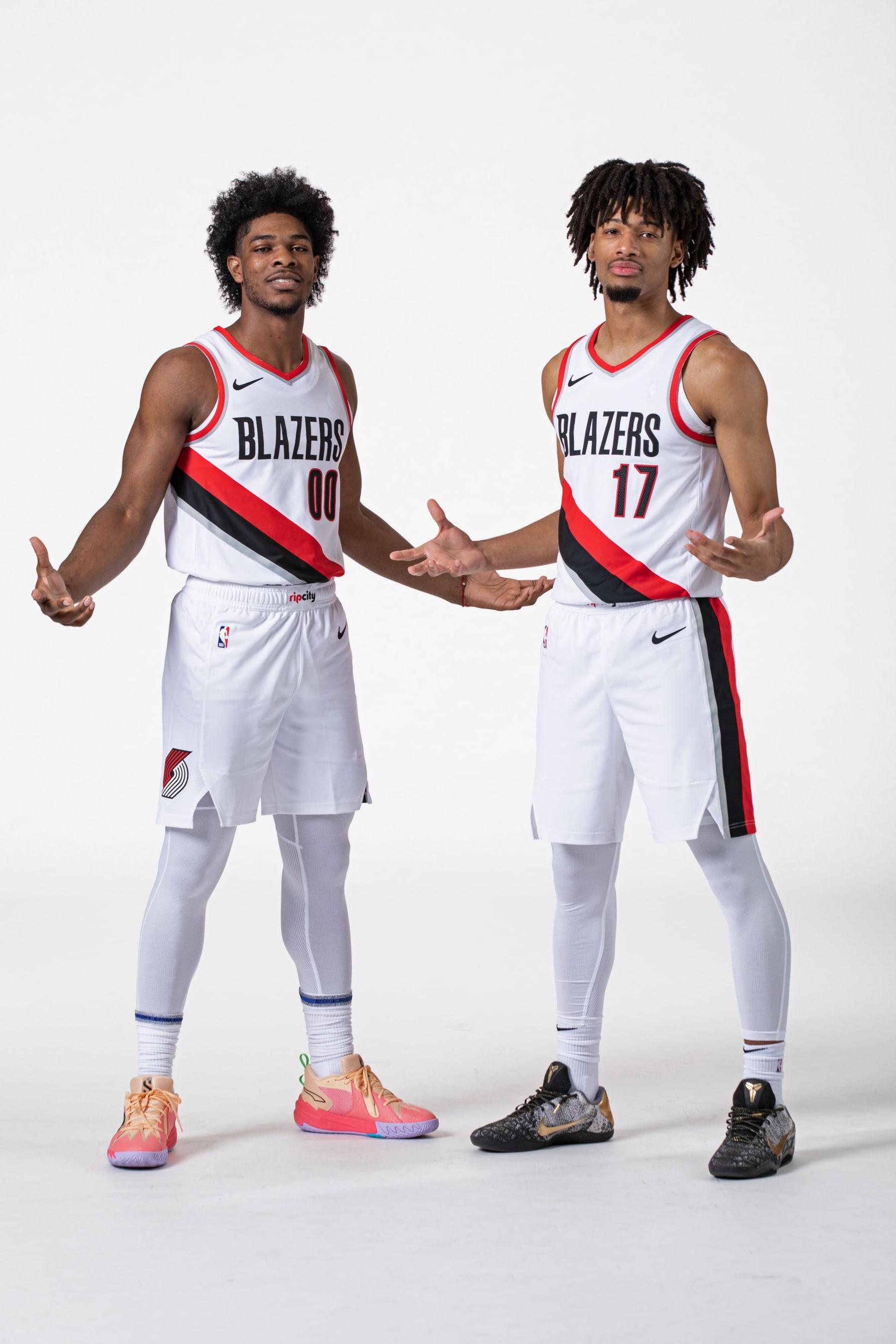 PORTLAND, OR - OCTOBER 2: Scoot Henderson #00 and Shaedon Sharpe #17 of the Portland Trail Blazers poses for a portrait during 2023-24 NBA Media Day on October 2, 2023 at the Moda Center Arena in Portland, Oregon. NOTE TO USER: User expressly acknowledges and agrees that, by downloading and or using this photograph, user is consenting to the terms and conditions of the Getty Images License Agreement. Mandatory Copyright Notice: Copyright 2023 NBAE (Photo by Cameron Browne/NBAE via Getty Images)