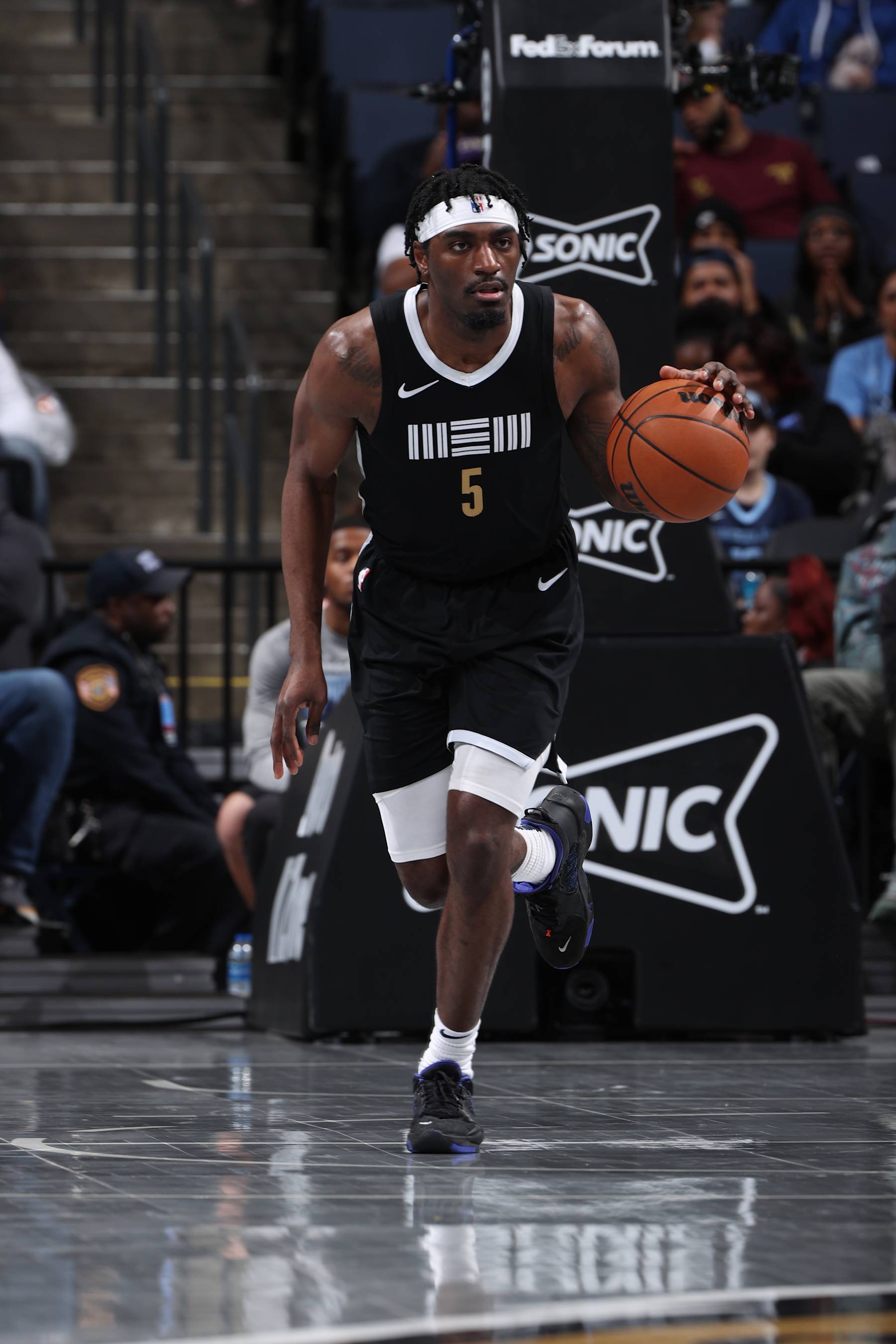 MEMPHIS, TN - MARCH 8: Vince Williams Jr. #5 of the Memphis Grizzlies dribbles the ball during the game against the Atlanta Hawks on March 8, 2024 at FedExForum in Memphis, Tennessee. NOTE TO USER: User expressly acknowledges and agrees that, by downloading and or using this photograph, User is consenting to the terms and conditions of the Getty Images License Agreement. Mandatory Copyright Notice: Copyright 2024 NBAE (Photo by Joe Murphy/NBAE via Getty Images)