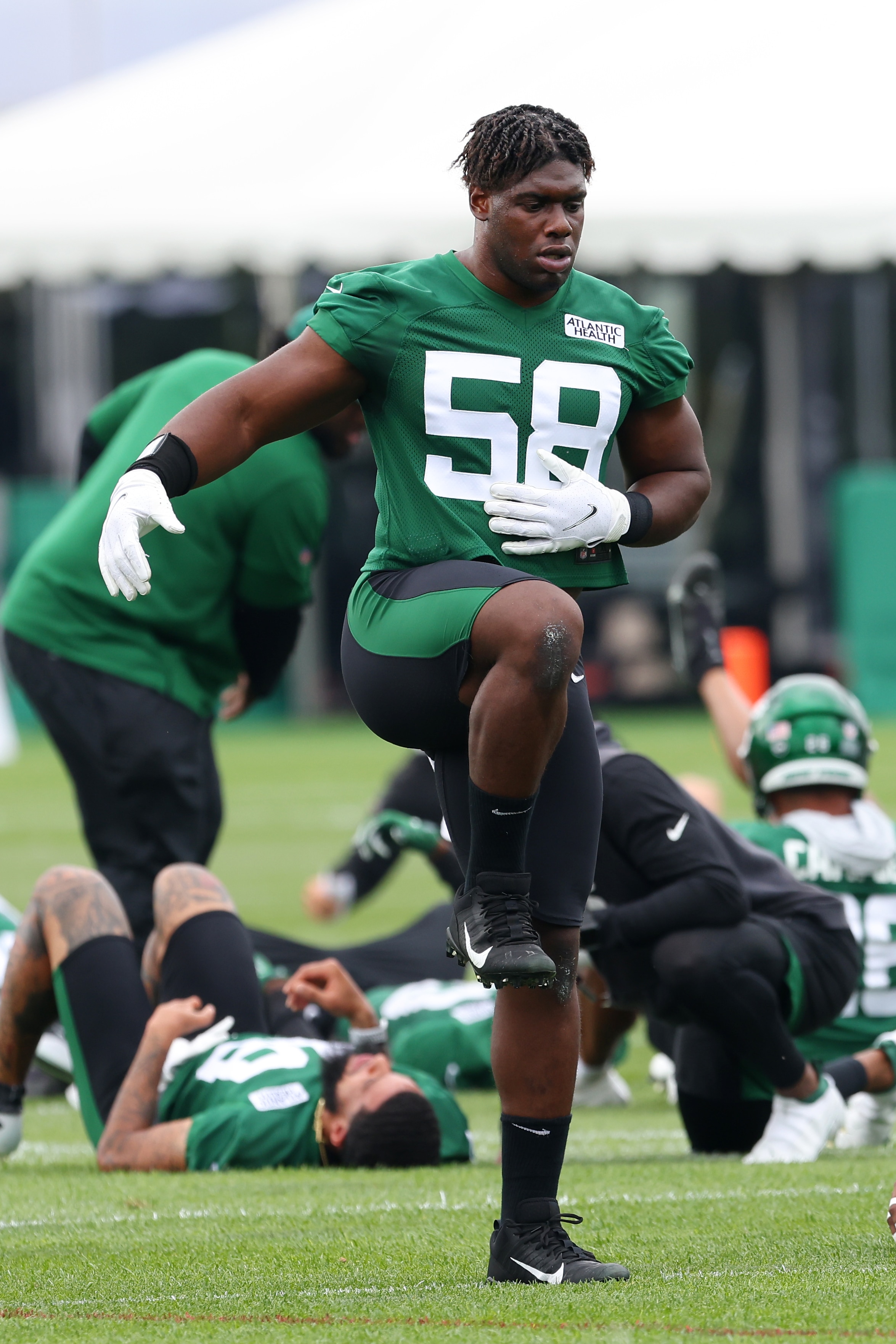 FLORHAM PARK, NJ - JULY 29: Carl Lawson #58 of the New York Jets works out during a morning practice at Atlantic Health Jets Training Center on July 29, 2021 in Florham Park, New Jersey. (Photo by Rich Schultz/Getty Images)