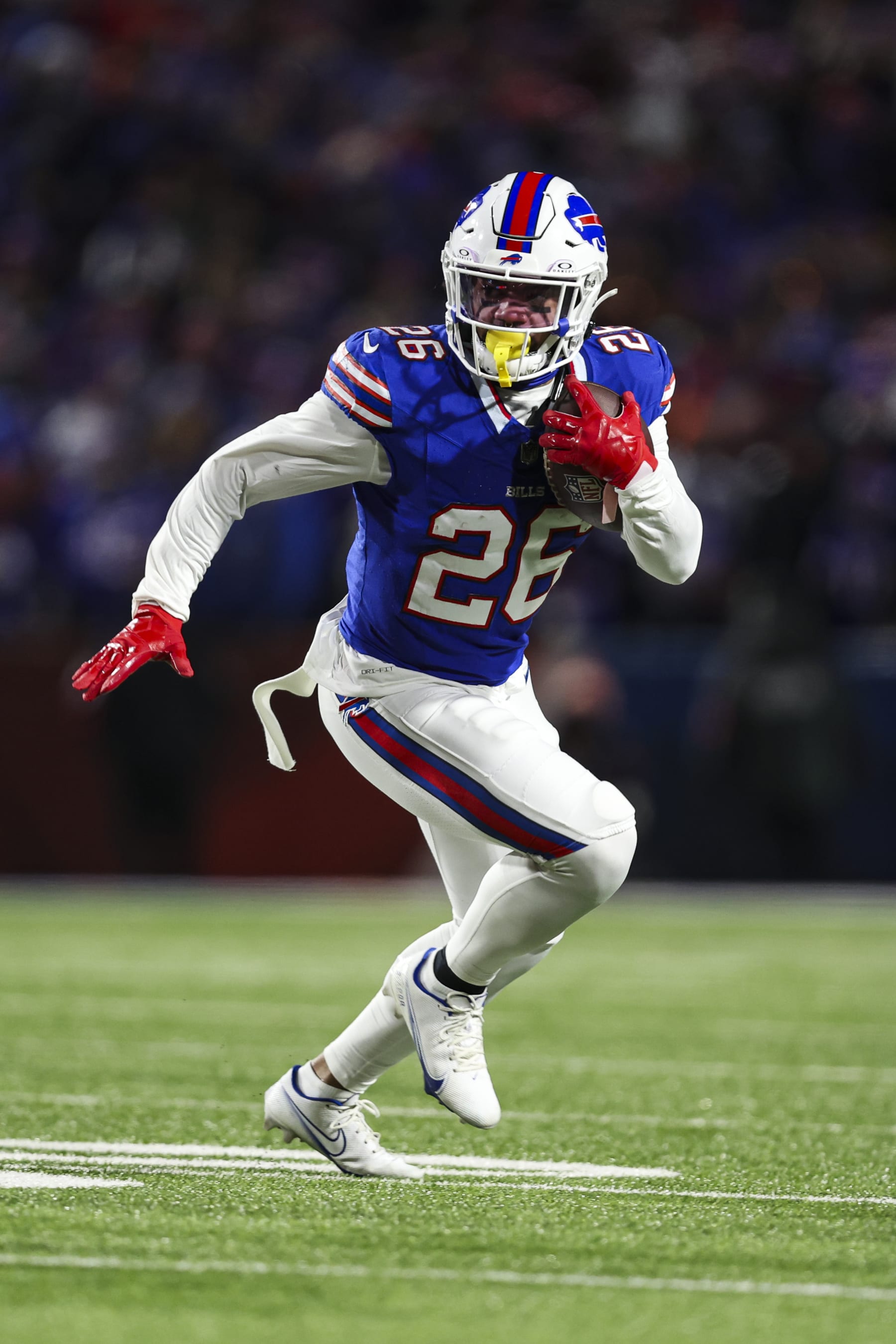 ORCHARD PARK, NY - JANUARY 21: Ty Johnson #26 of the Buffalo Bills runs the ball during an NFL divisional round playoff football game against the Kansas City Chiefs at Highmark Stadium on January 21, 2024 in Orchard Park, New York. (Photo by Perry Knotts/Getty Images) ORCHARD PARK, NY - JANUARY 21: Ty Johnson #26 of the Buffalo Bills runs the ball during an NFL divisional round playoff football game against the Kansas City Chiefs at Highmark Stadium on January 21, 2024 in Orchard Park, New York. (Photo by Perry Knotts/Getty Images)